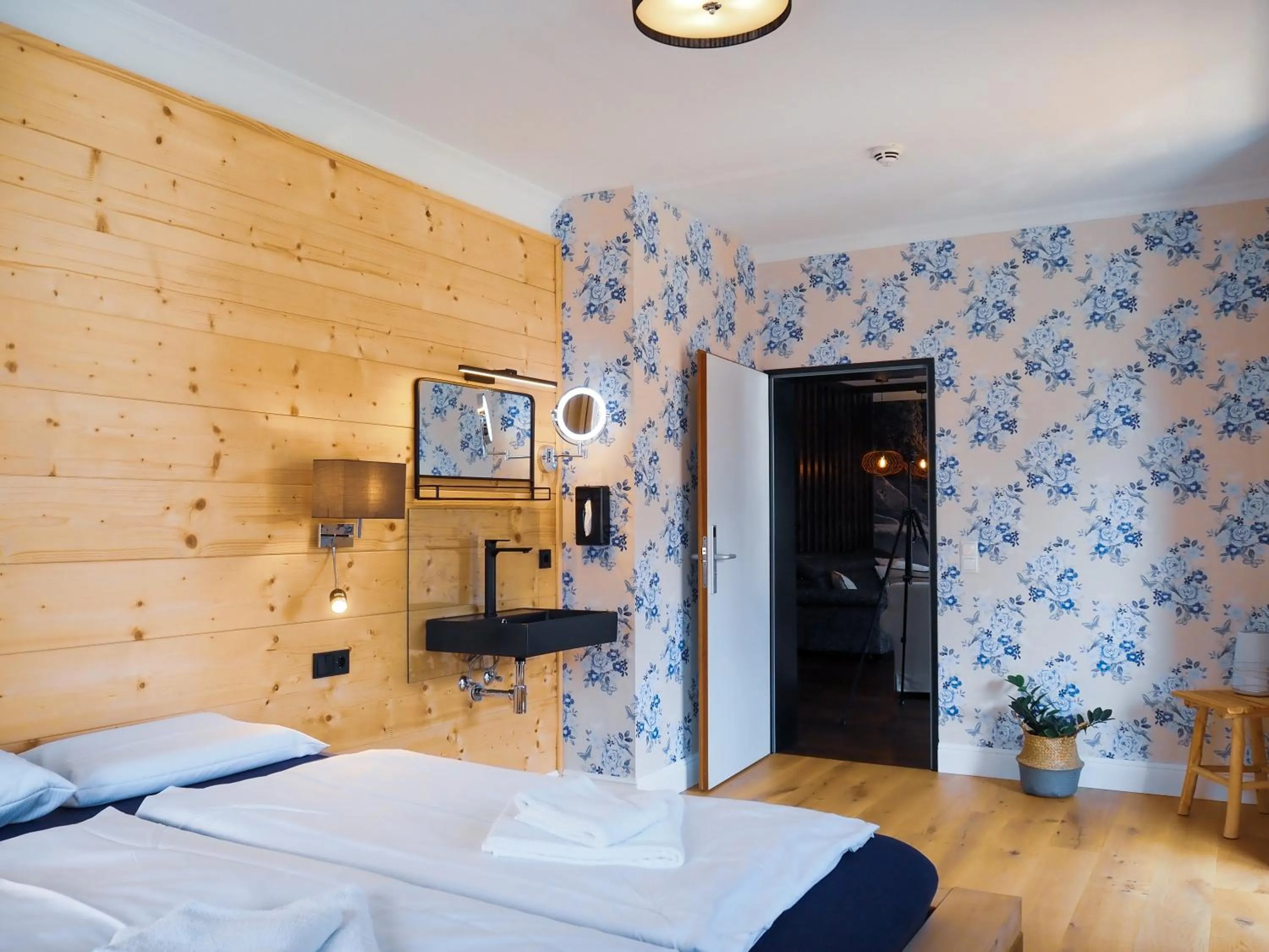 Bedroom, Bed in Design Hotel ALPENLIEBE - - - - Boutique-Flair - - - -