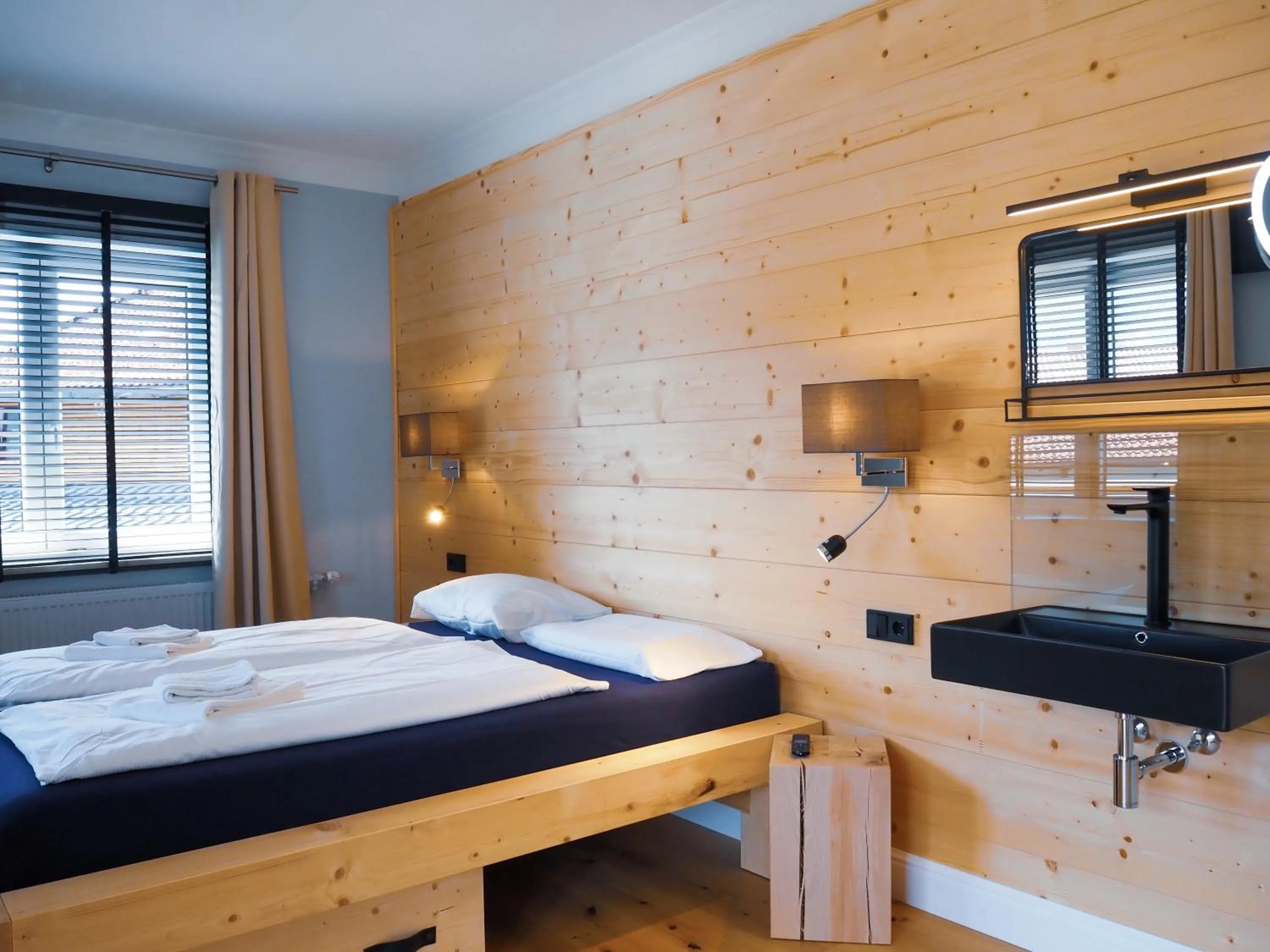 Bedroom, Bed in Design Hotel ALPENLIEBE - - - - Boutique-Flair - - - -