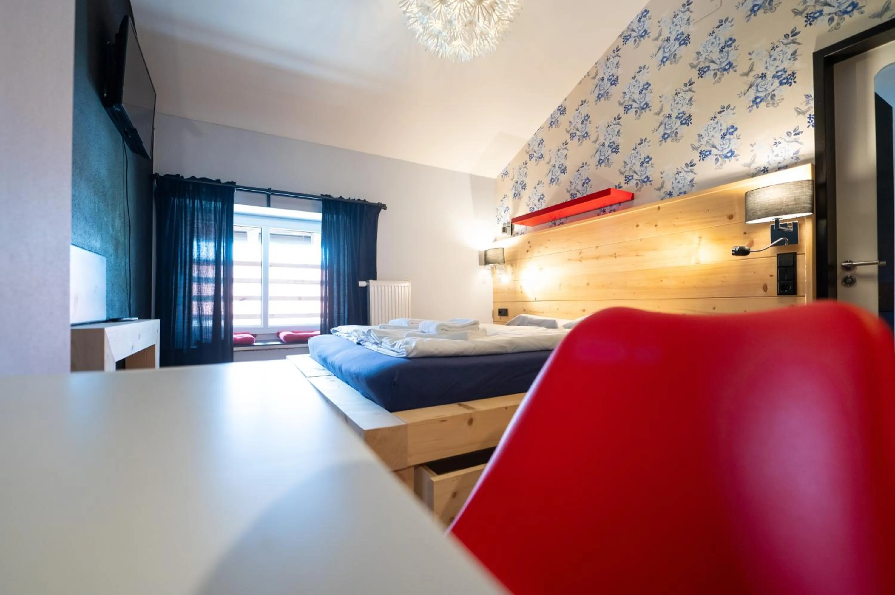 Photo of the whole room, Bed in Design Hotel ALPENLIEBE - - - - Boutique-Flair - - - -