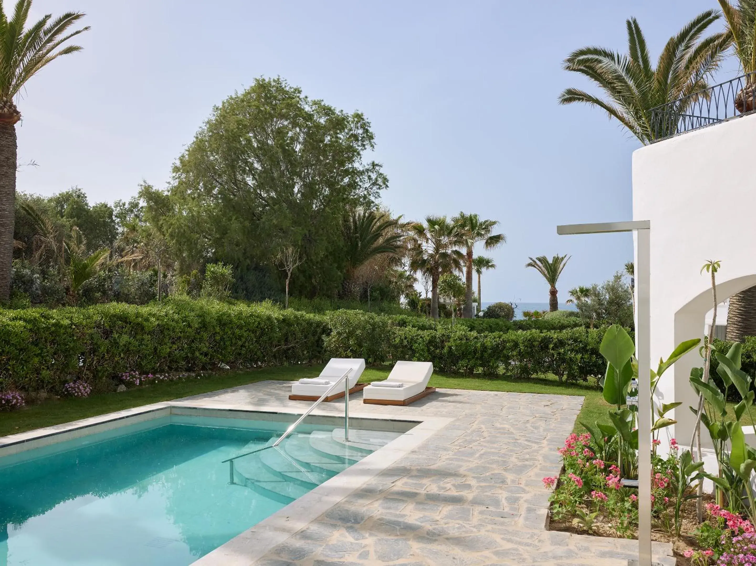 Pool view in Caramel, A Grecotel Resort to Live Pool view in Caramel, A Grecotel Resort to Live