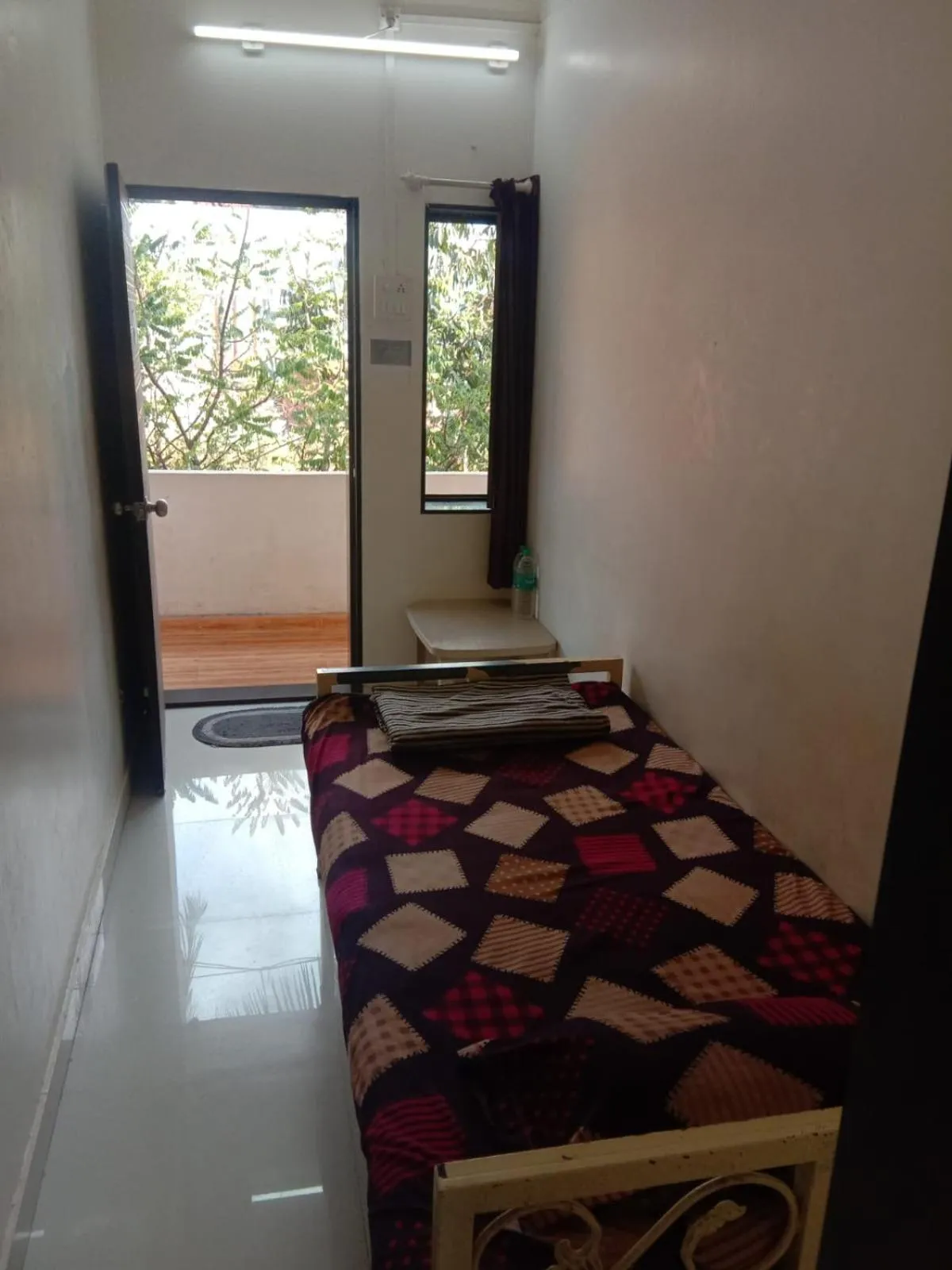 Bed in Hemprabha Bed & Breakfast, Ratnagiri