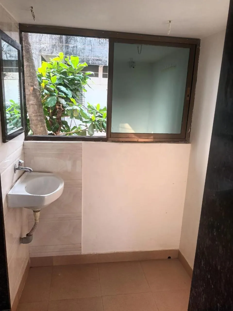 Toilet in Hemprabha Bed & Breakfast, Ratnagiri
