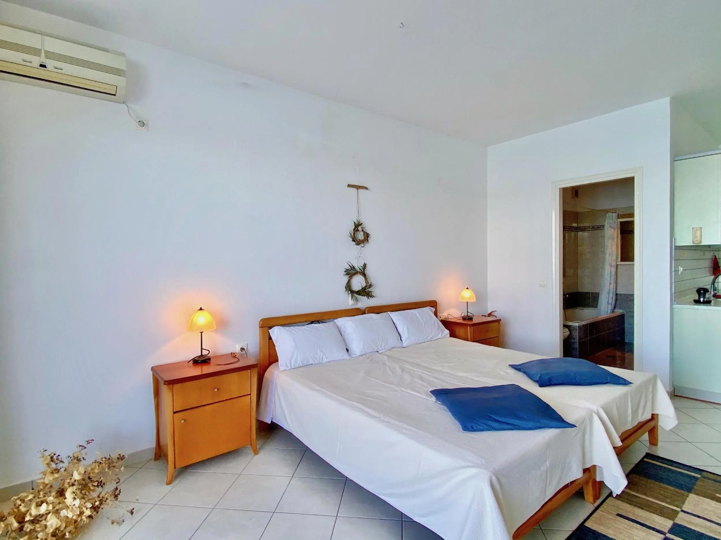 Bedroom, Bed in SeaFront Villa Ourania