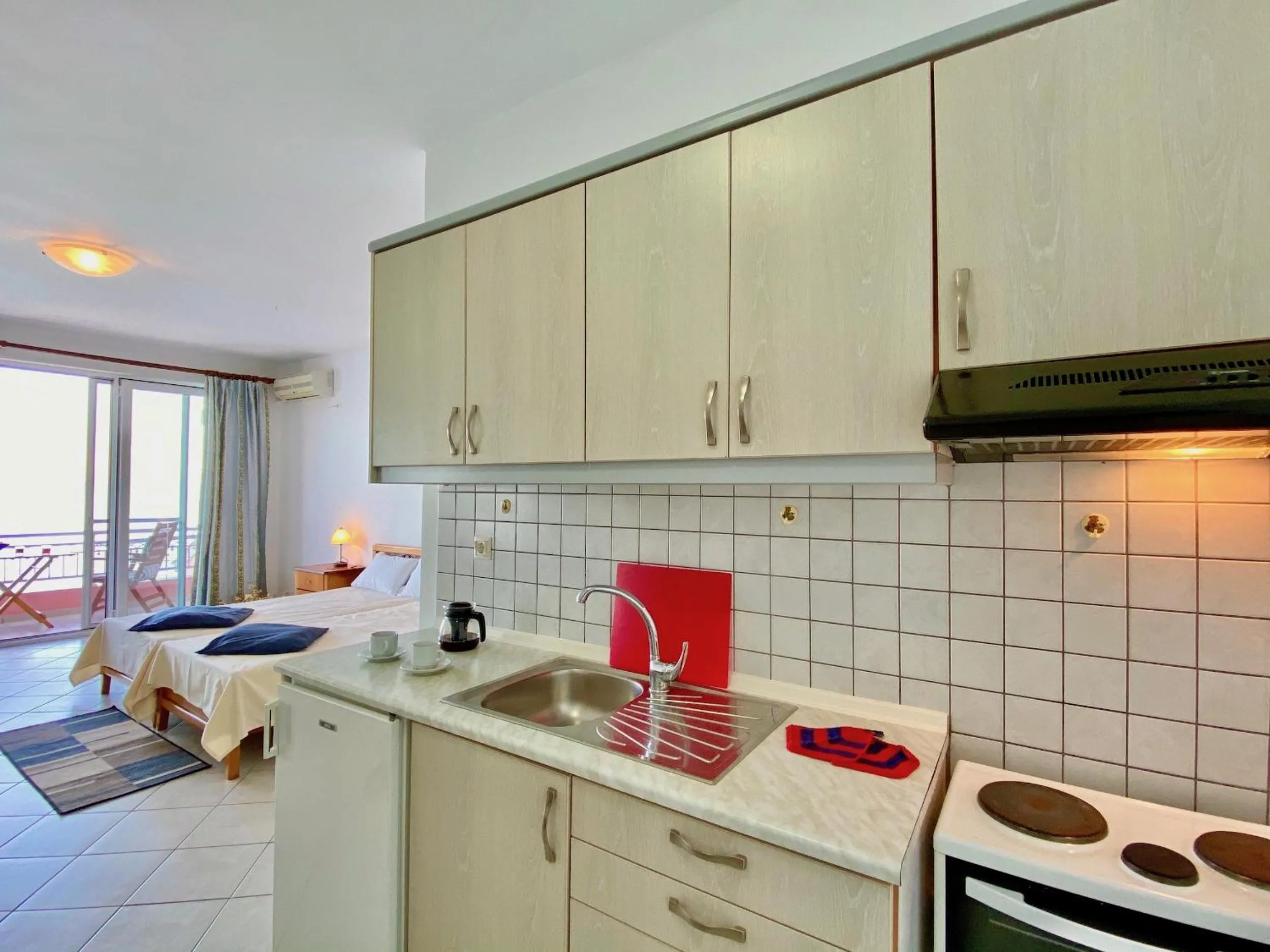 Kitchen or kitchenette in SeaFront Villa Ourania