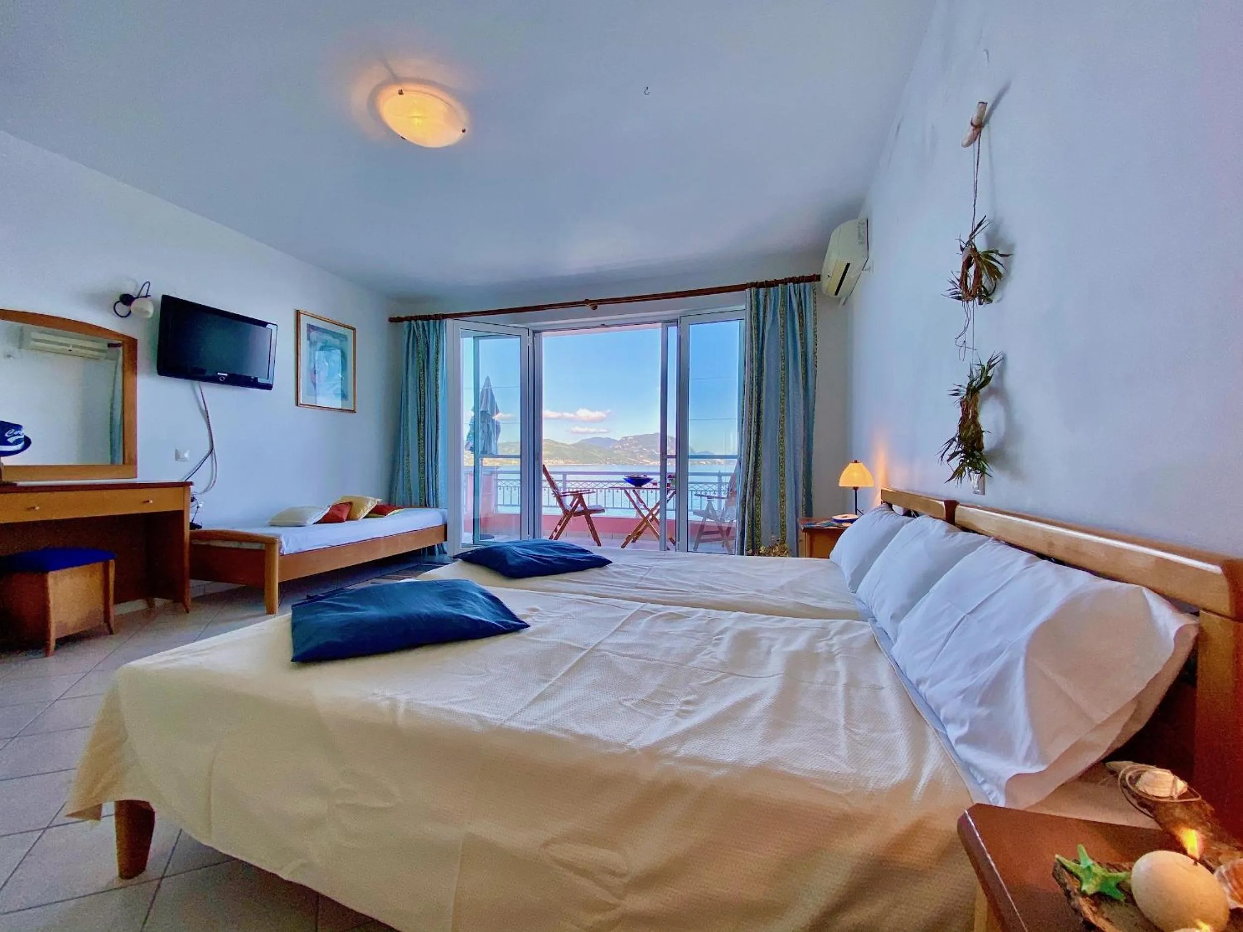 Bedroom, Bed in SeaFront Villa Ourania