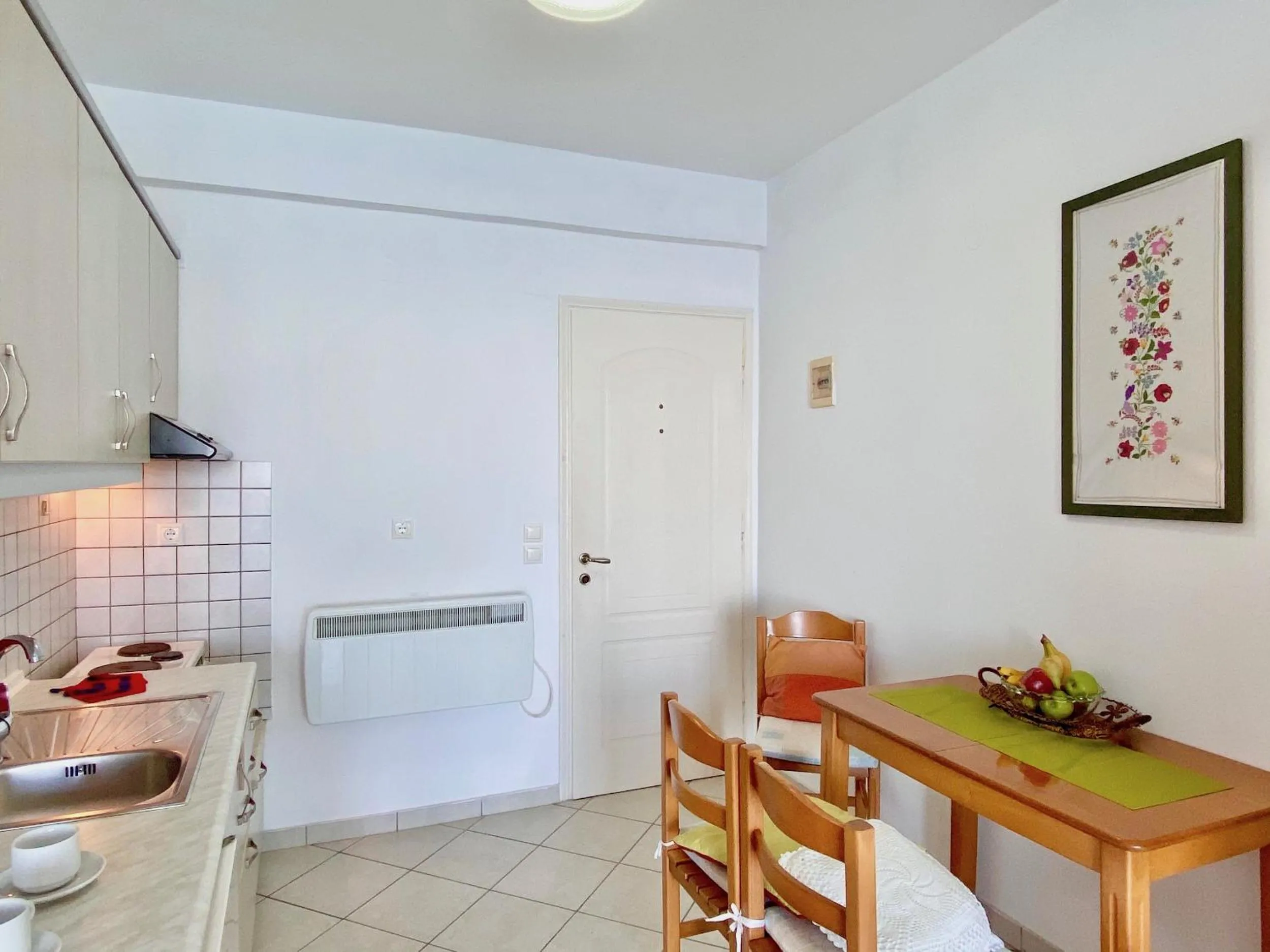 Kitchen or kitchenette in SeaFront Villa Ourania
