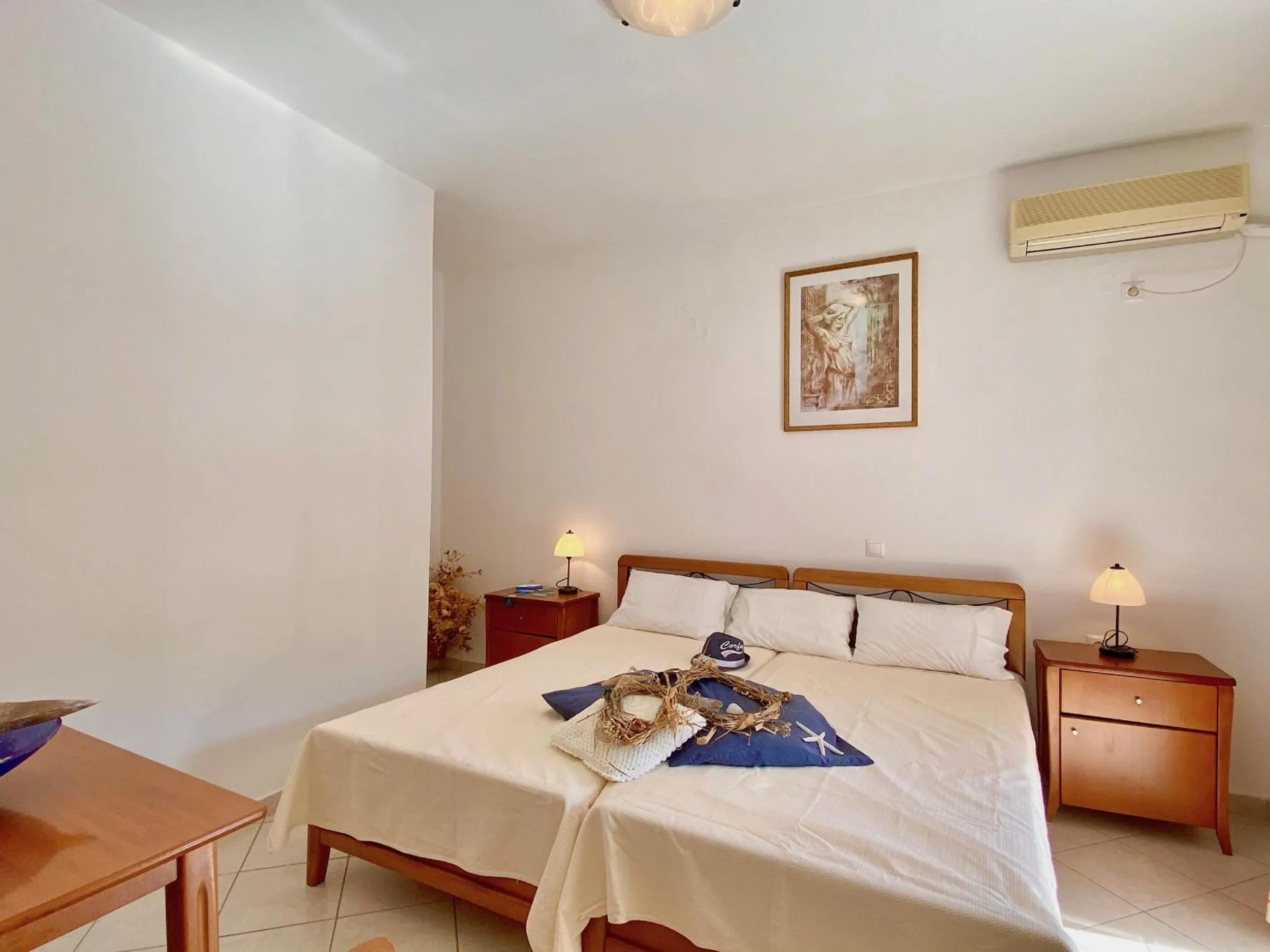 Bedroom, Bed in SeaFront Villa Ourania