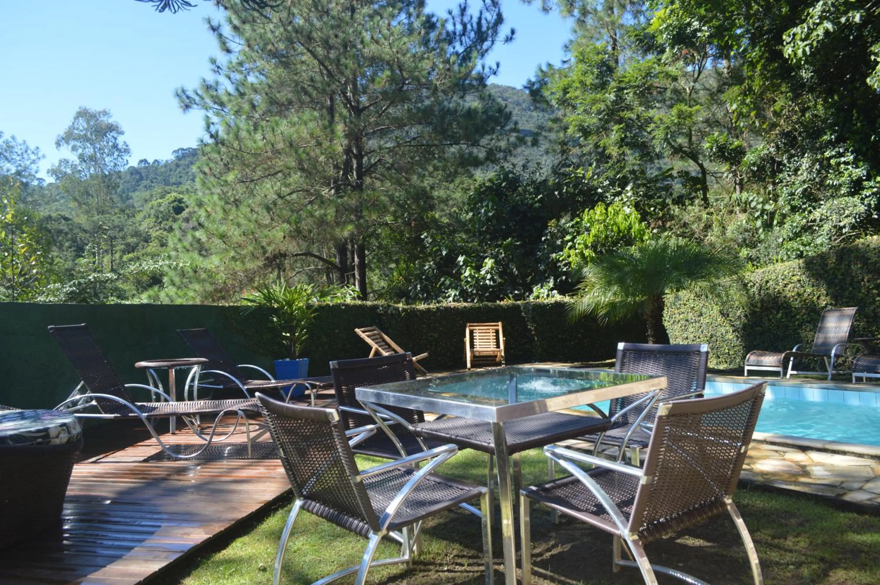 Swimming pool in Pousada Refúgio das Aves