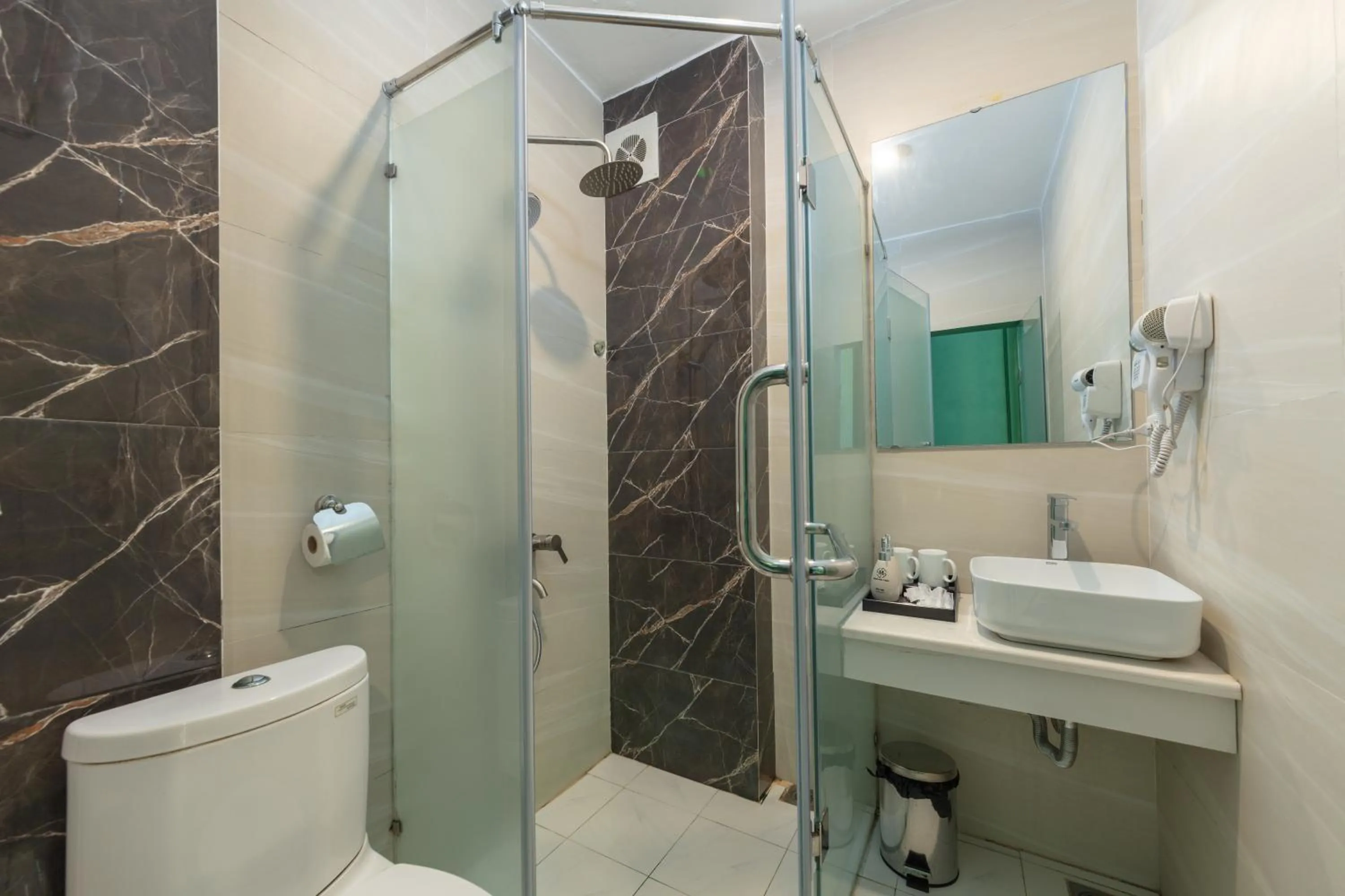 Bathroom in Madelise Adora Hotel & Travel