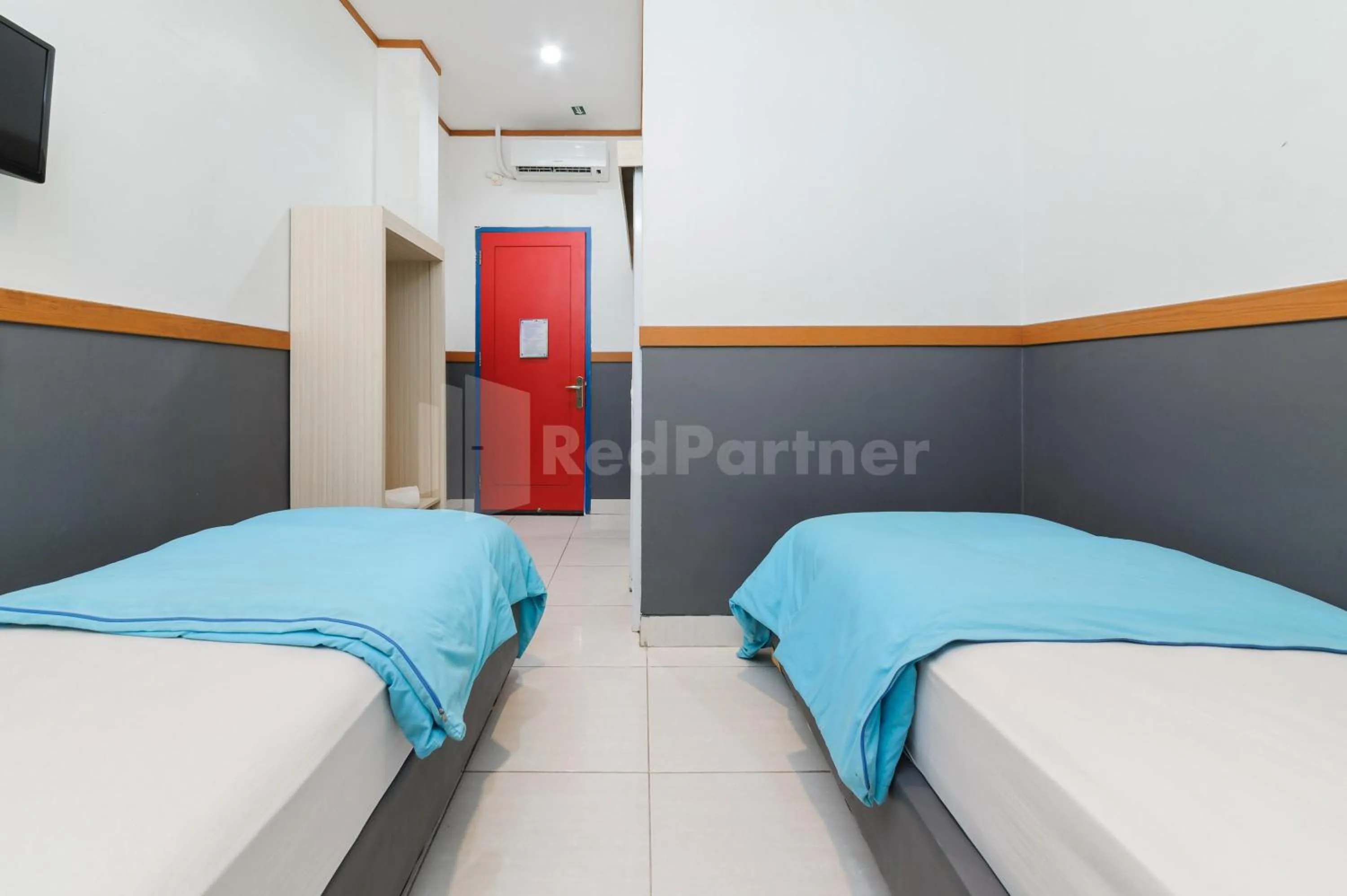 Bedroom, Bed in Ian Hotel Jaksa Mitra RedDoorz