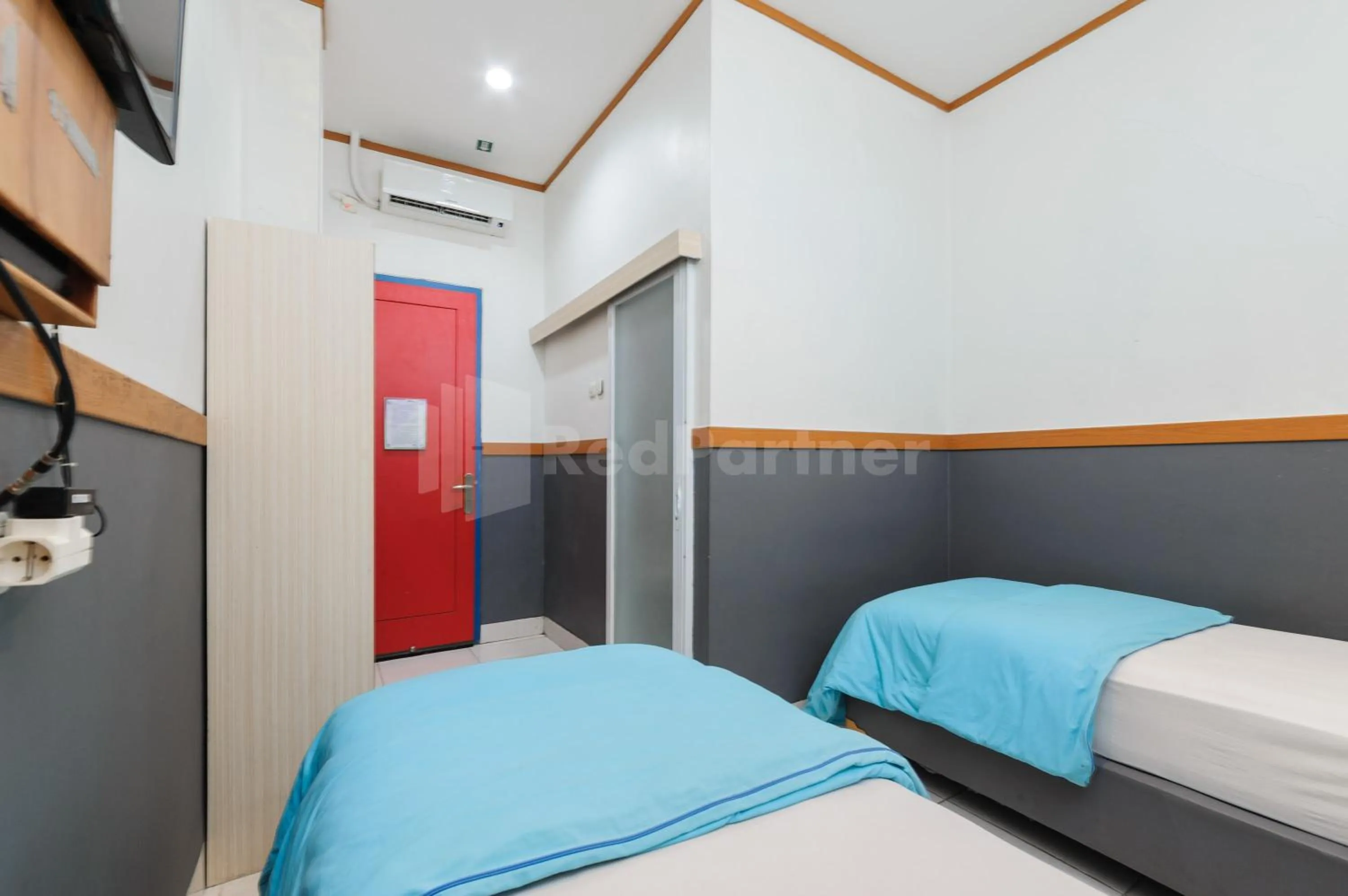 Bedroom, Bed in Ian Hotel Jaksa Mitra RedDoorz