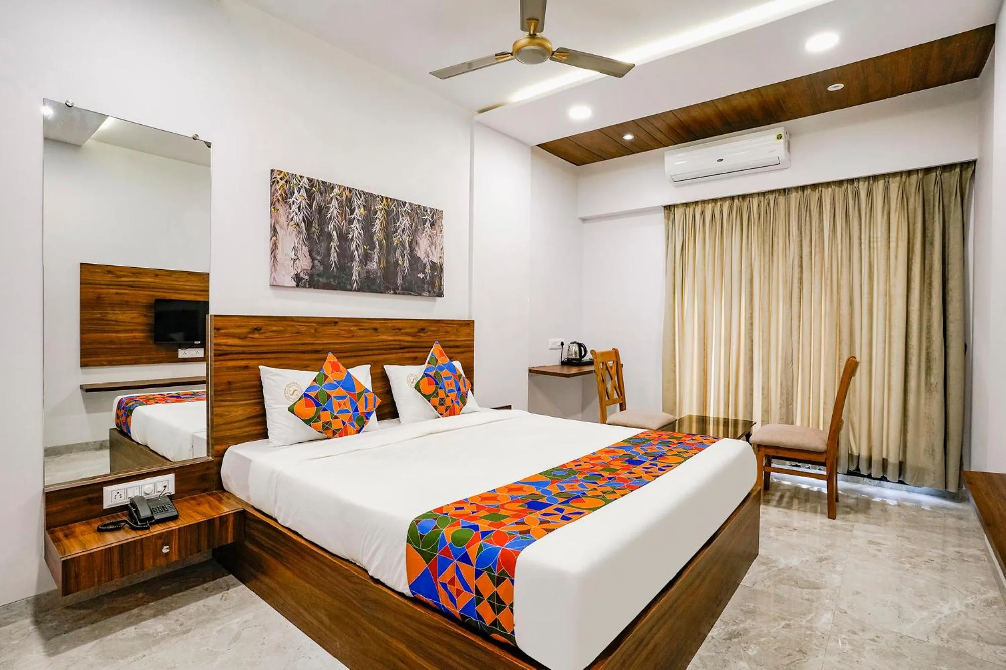 Bed in FabHotel Swaraj