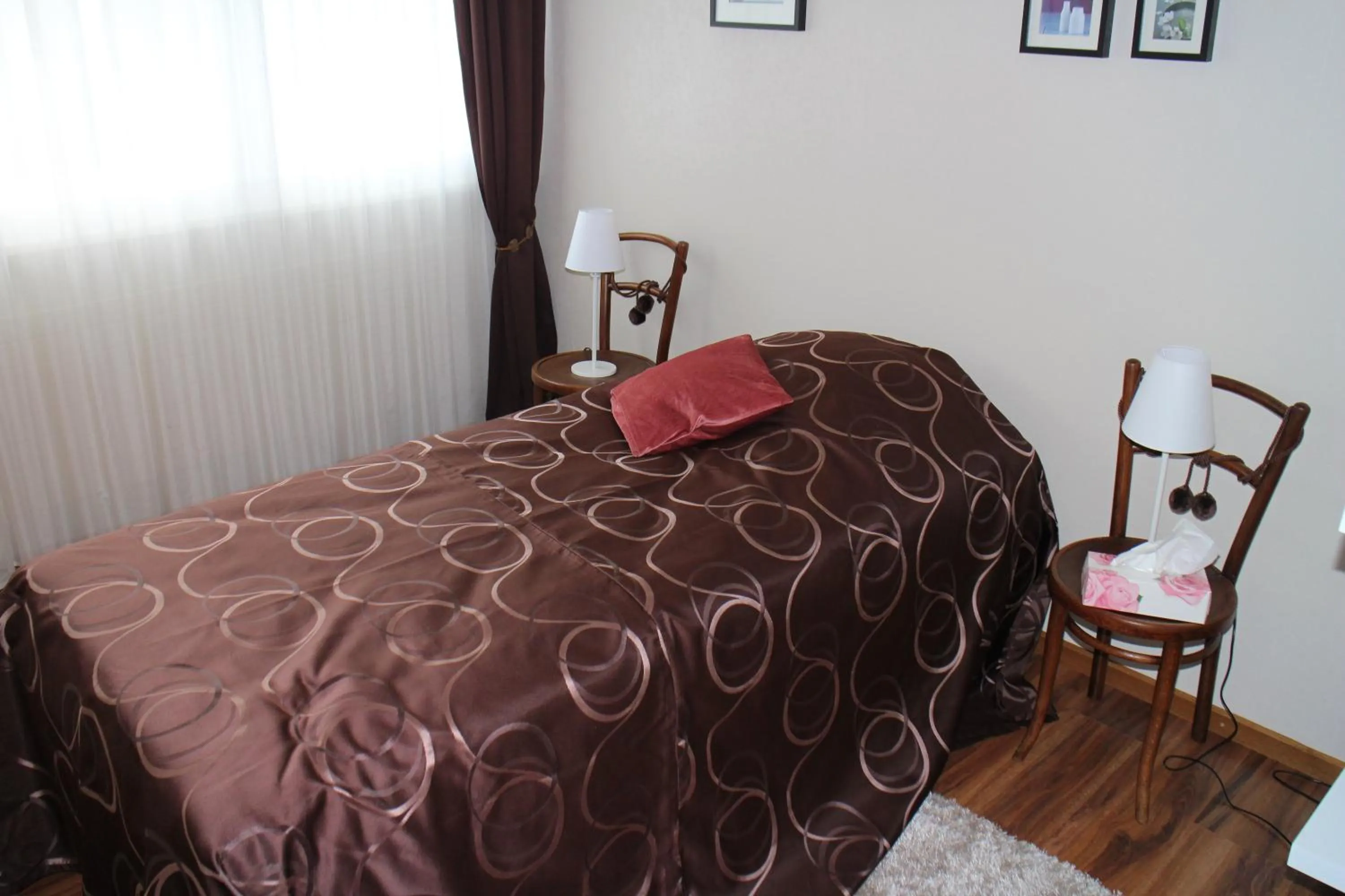 Bed in Les Petites Chambres de la Bleue Maison