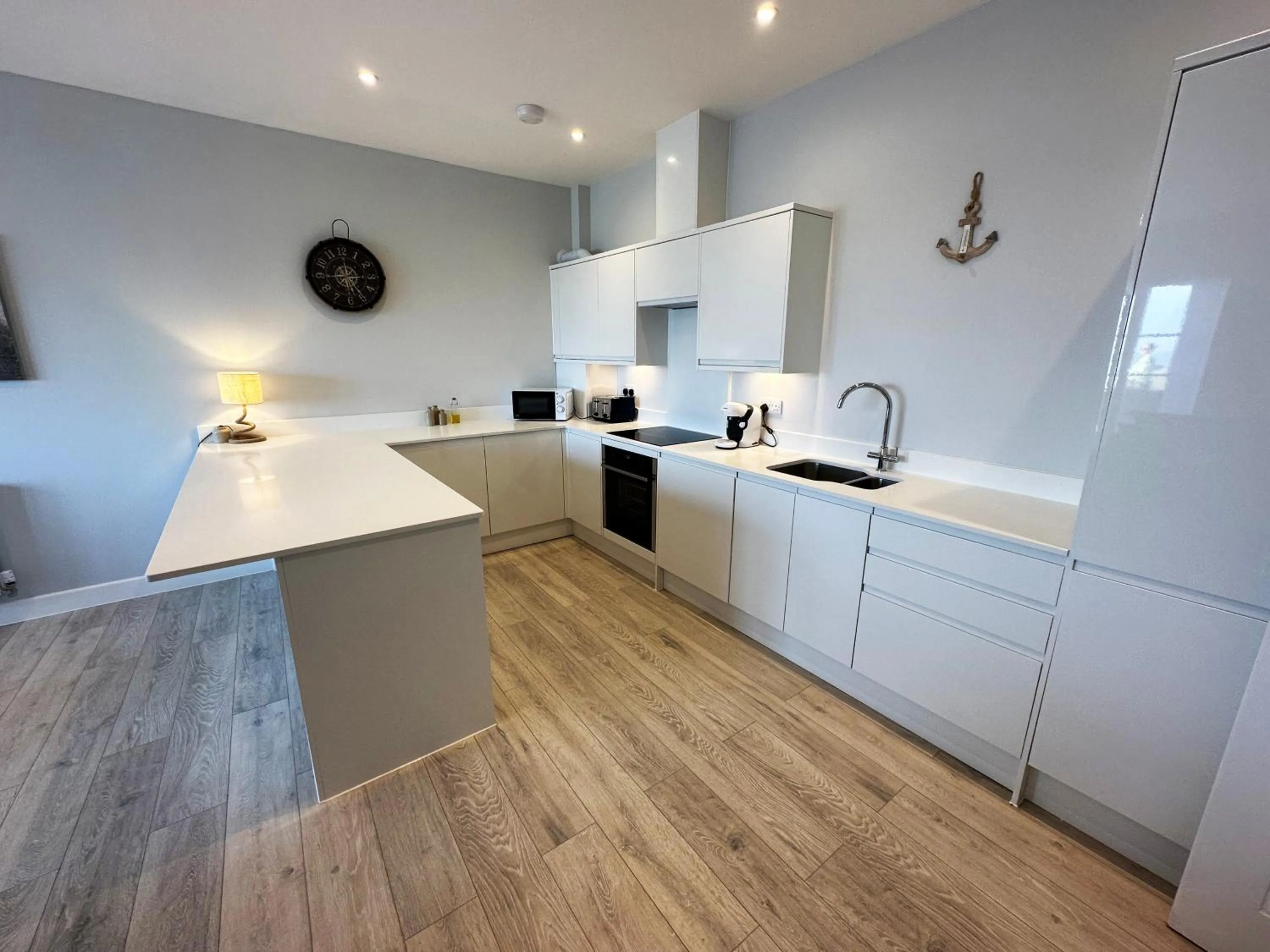Kitchen or kitchenette in Ocean View Suite - Near Hythe - On Beach Seafront - Private Parking