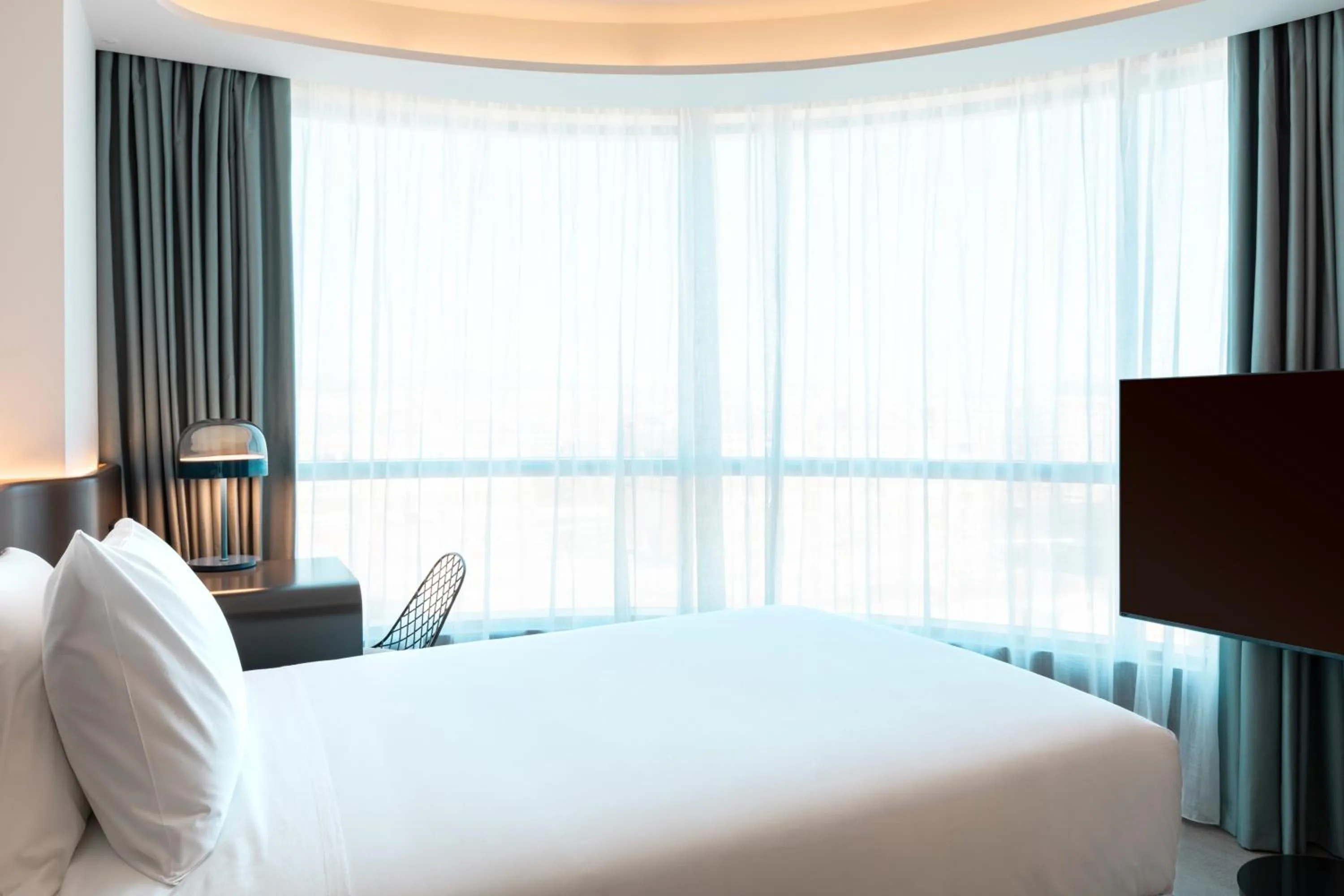 Bedroom, Bed in Labtwentytwo Barcelona, a Tribute Portfolio Hotel by Marriott