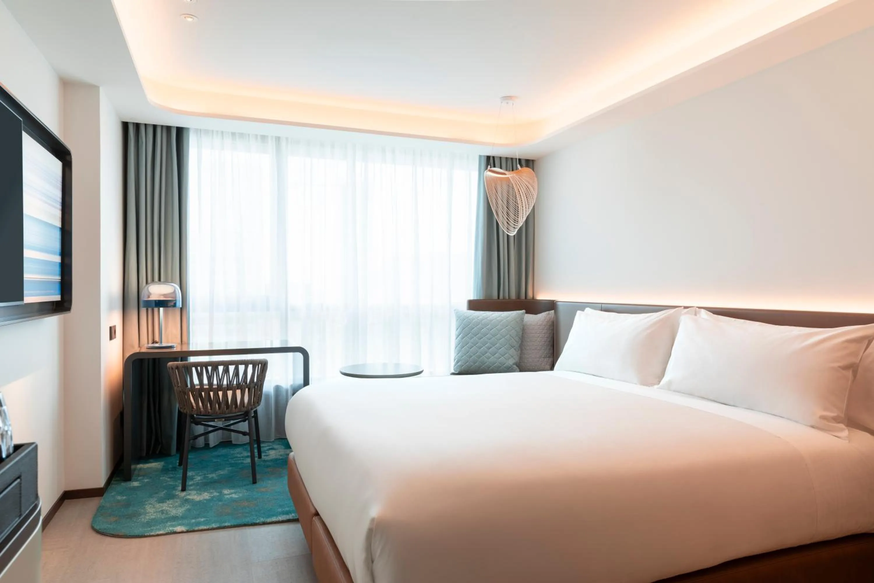 Bedroom, Bed in Labtwentytwo Barcelona, a Tribute Portfolio Hotel by Marriott