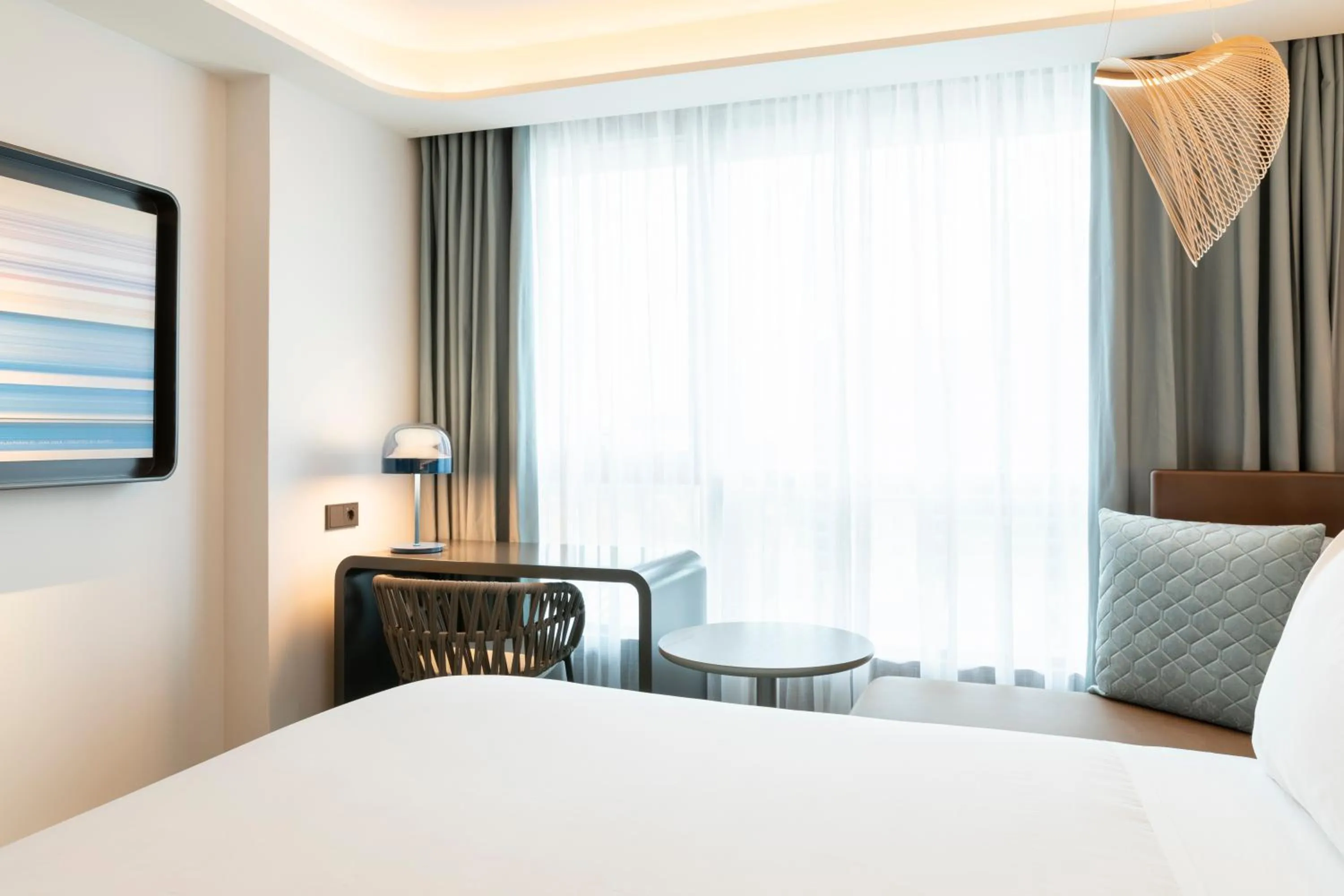 Bedroom, Bed in Labtwentytwo Barcelona, a Tribute Portfolio Hotel by Marriott