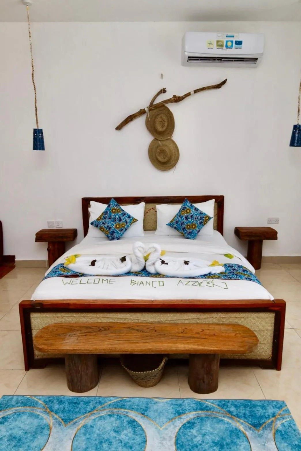 Bed in BIANCO AZZURRO Hotel & Restaurant