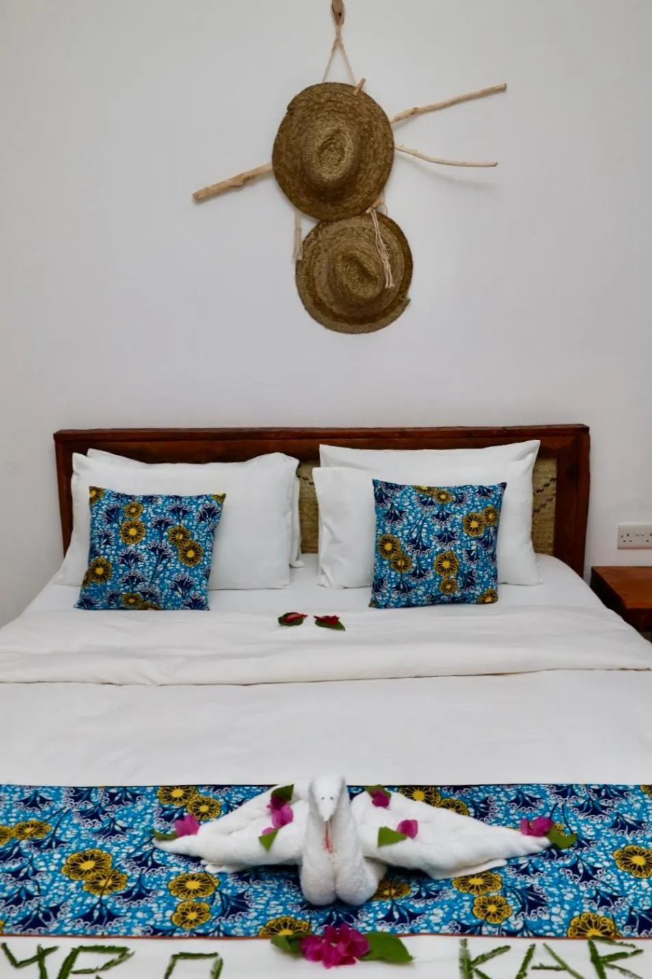 Bed in BIANCO AZZURRO Hotel & Restaurant