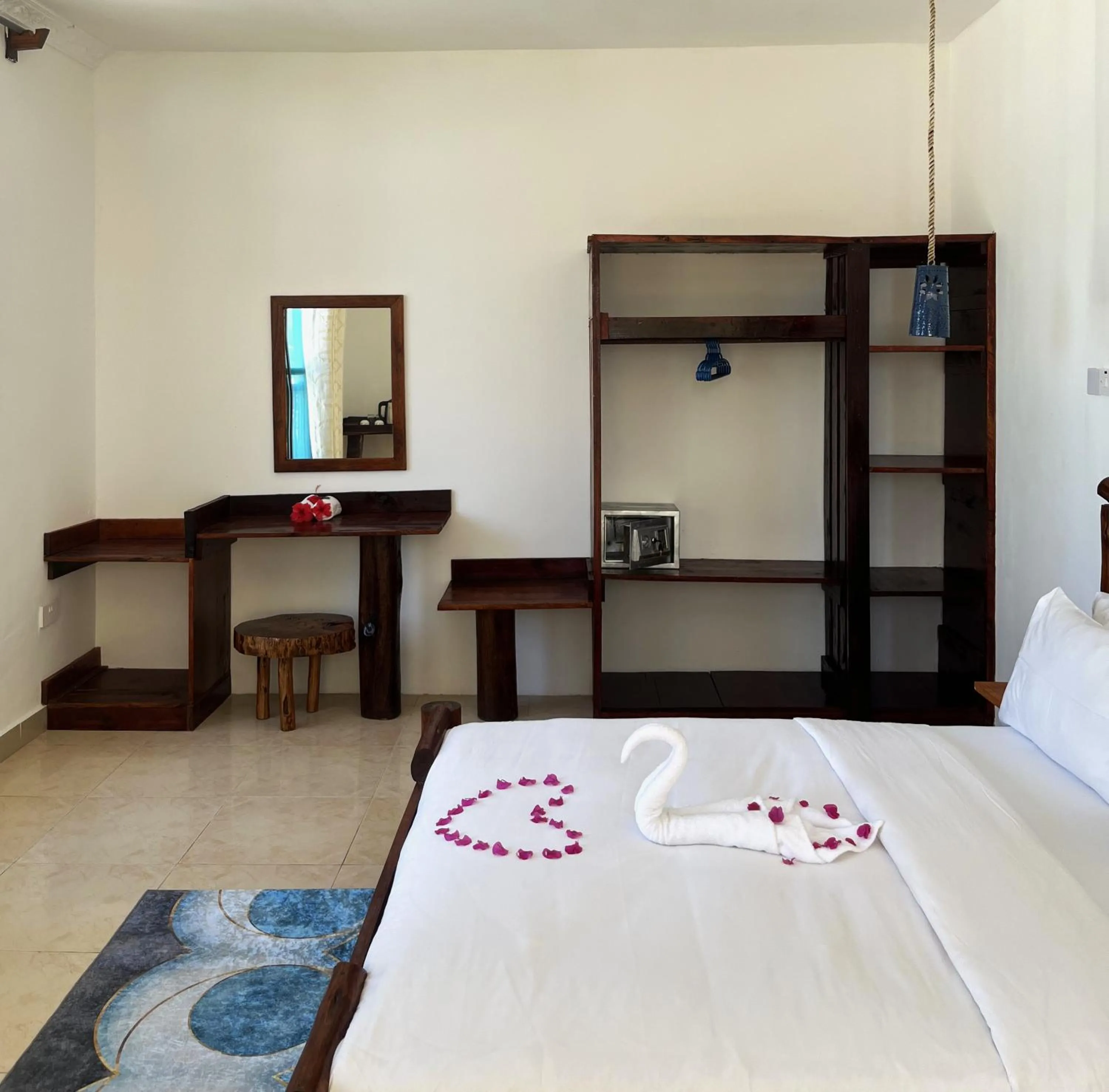 Bed in BIANCO AZZURRO Hotel & Restaurant