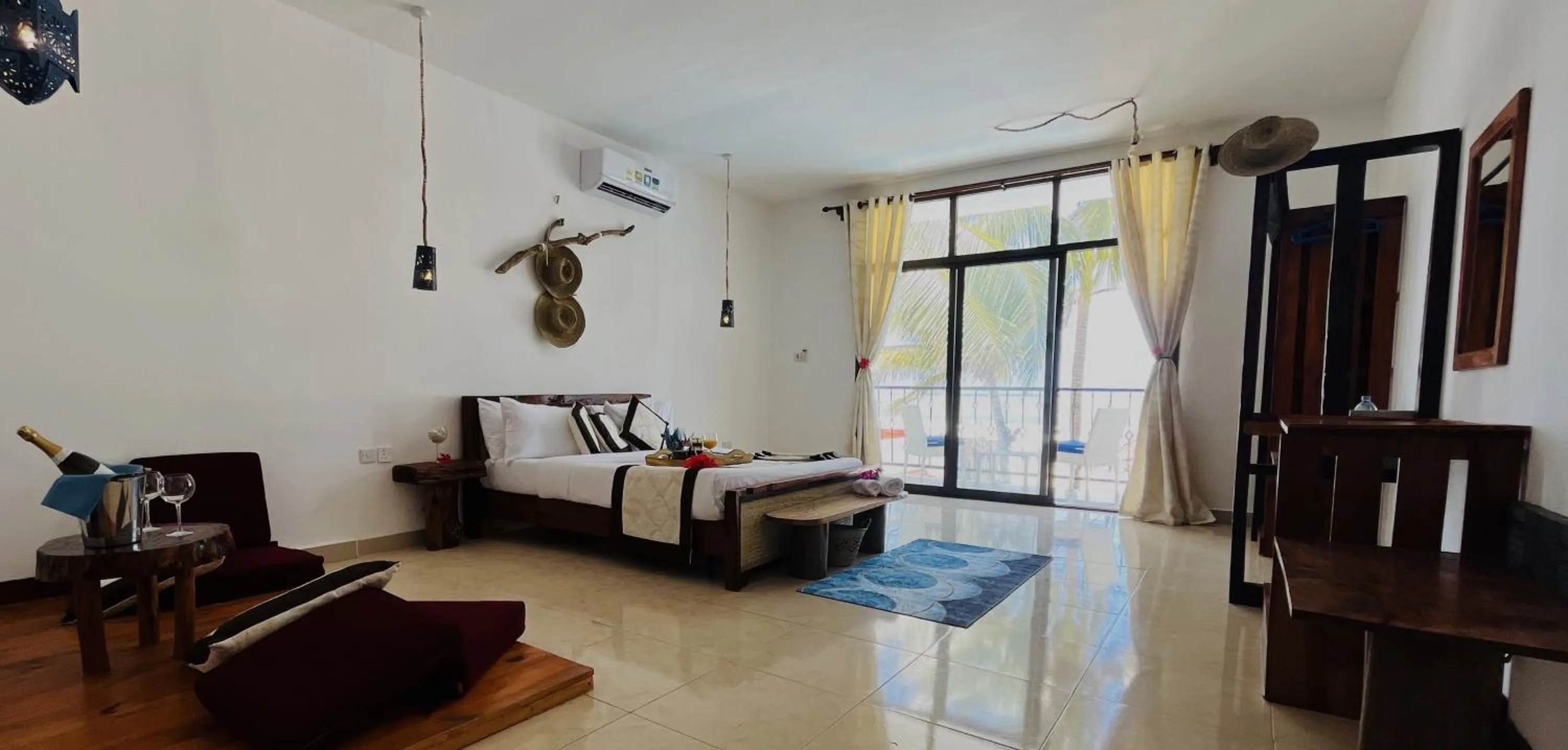 Bed in BIANCO AZZURRO Hotel & Restaurant