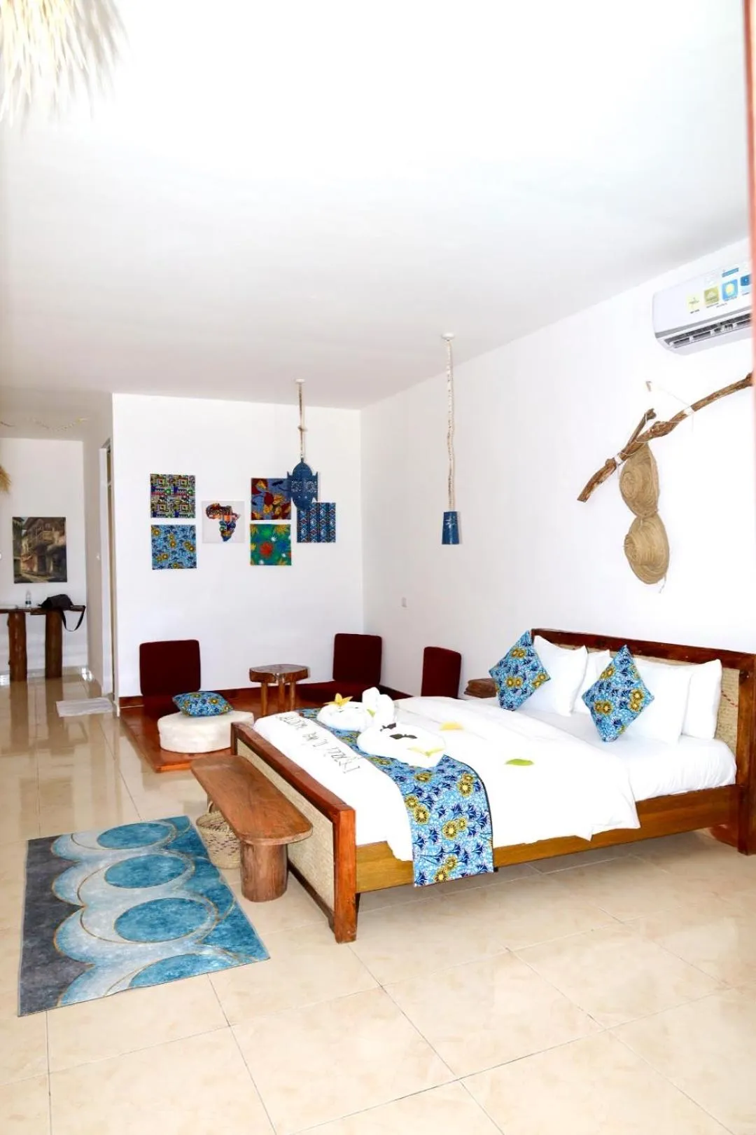 Bed in BIANCO AZZURRO Hotel & Restaurant