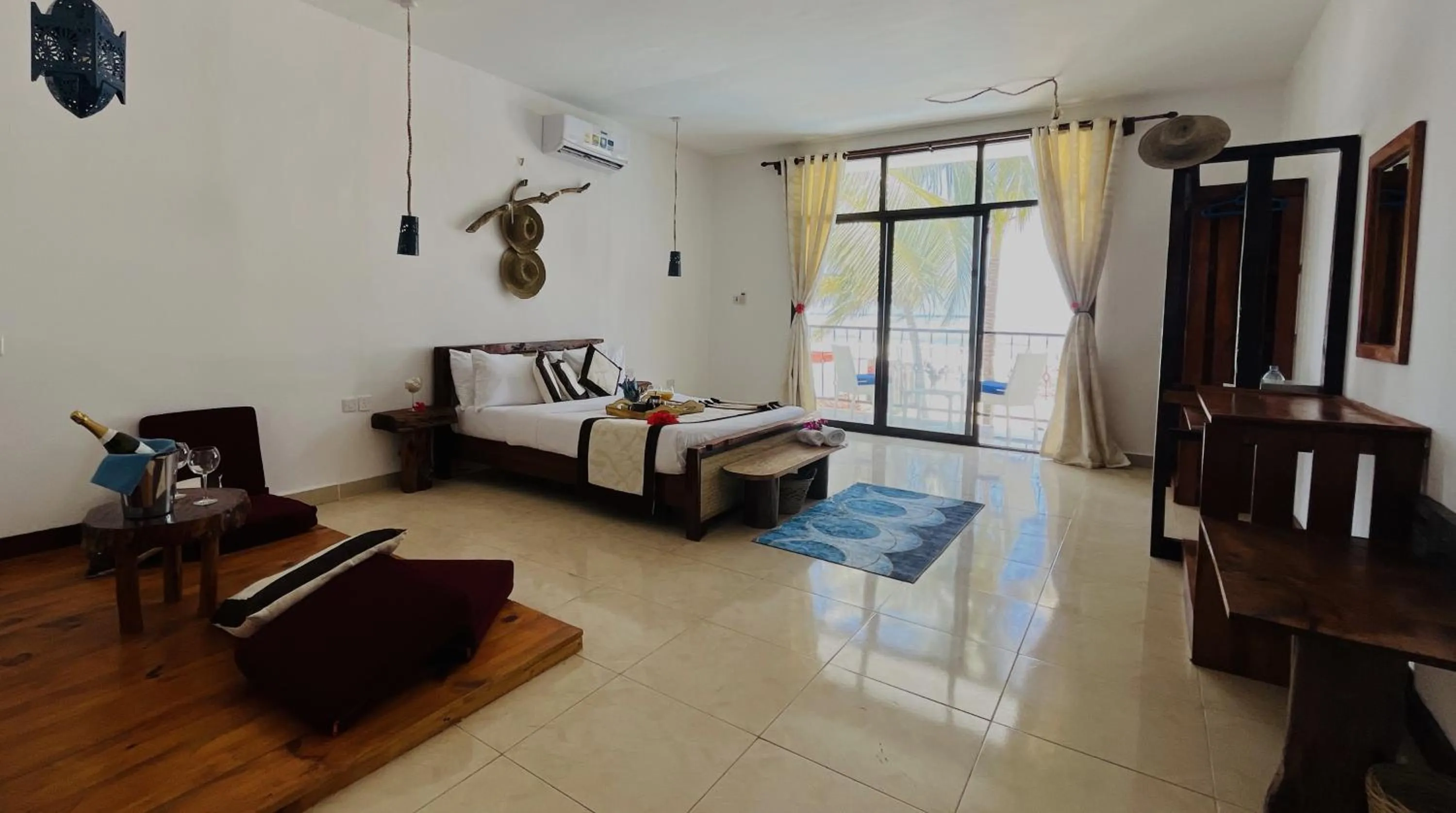 Bed in BIANCO AZZURRO Hotel & Restaurant