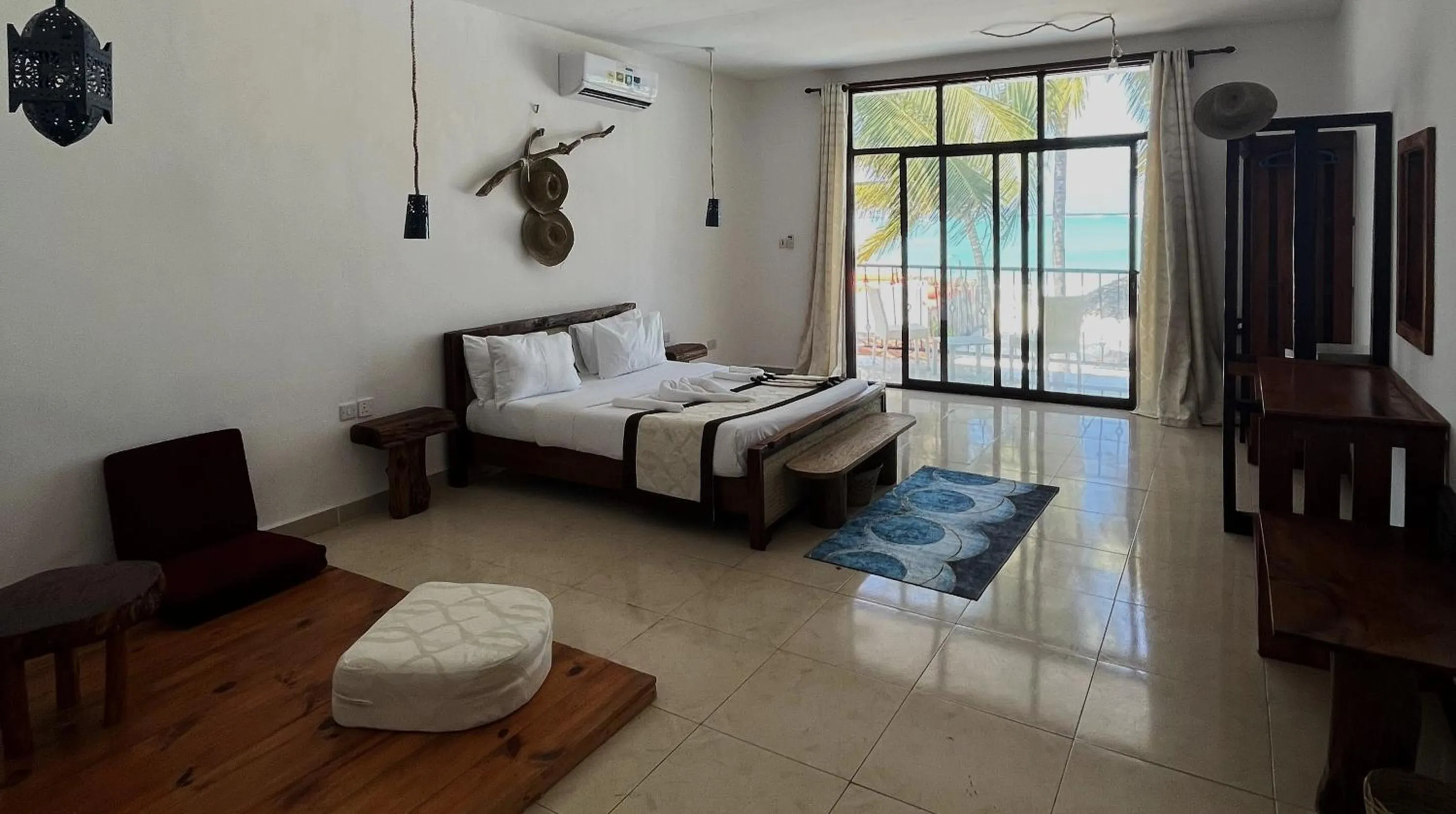 Bed in BIANCO AZZURRO Hotel & Restaurant