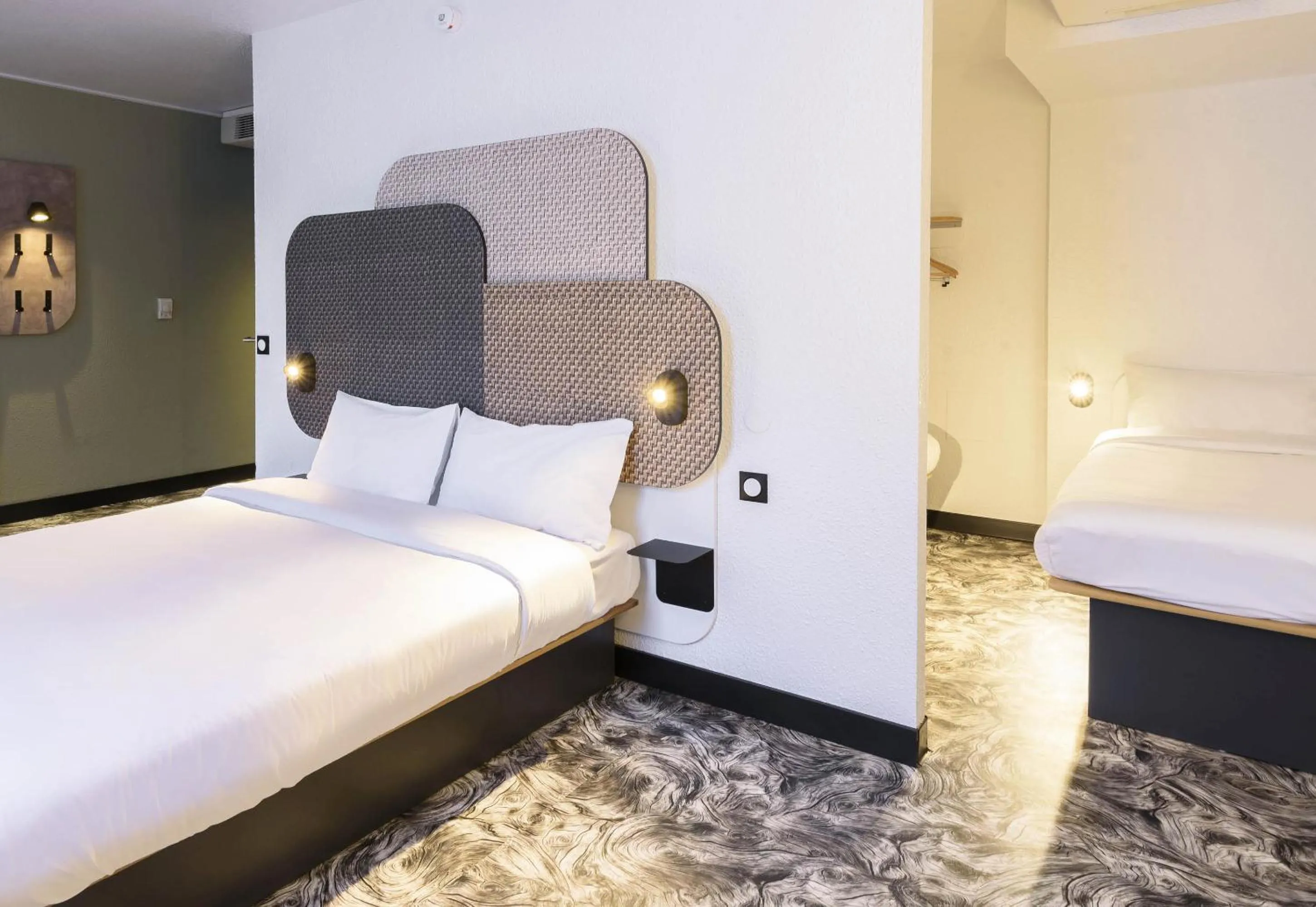 Bed in B&B HOTEL Toulouse Cité de l'Espace Gonord