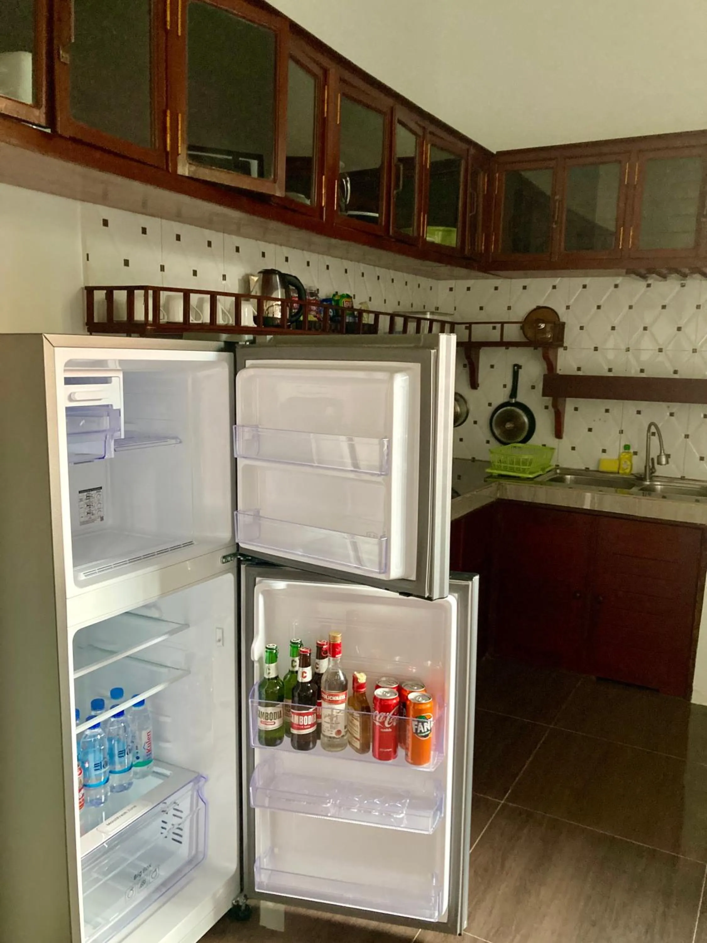 Kitchen or kitchenette in Lotus Haven Villa