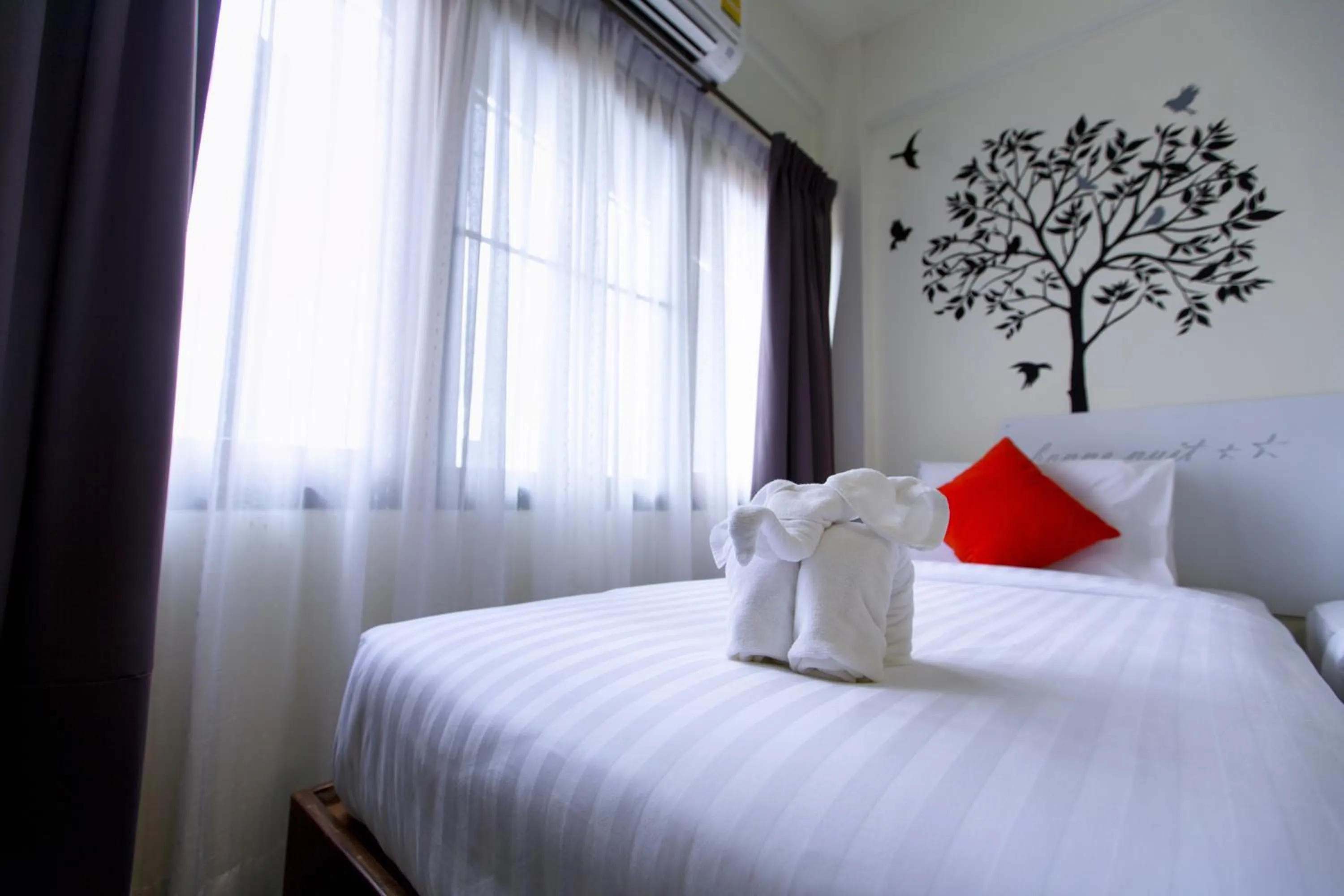 Bed in SOHO Boutique Hotel