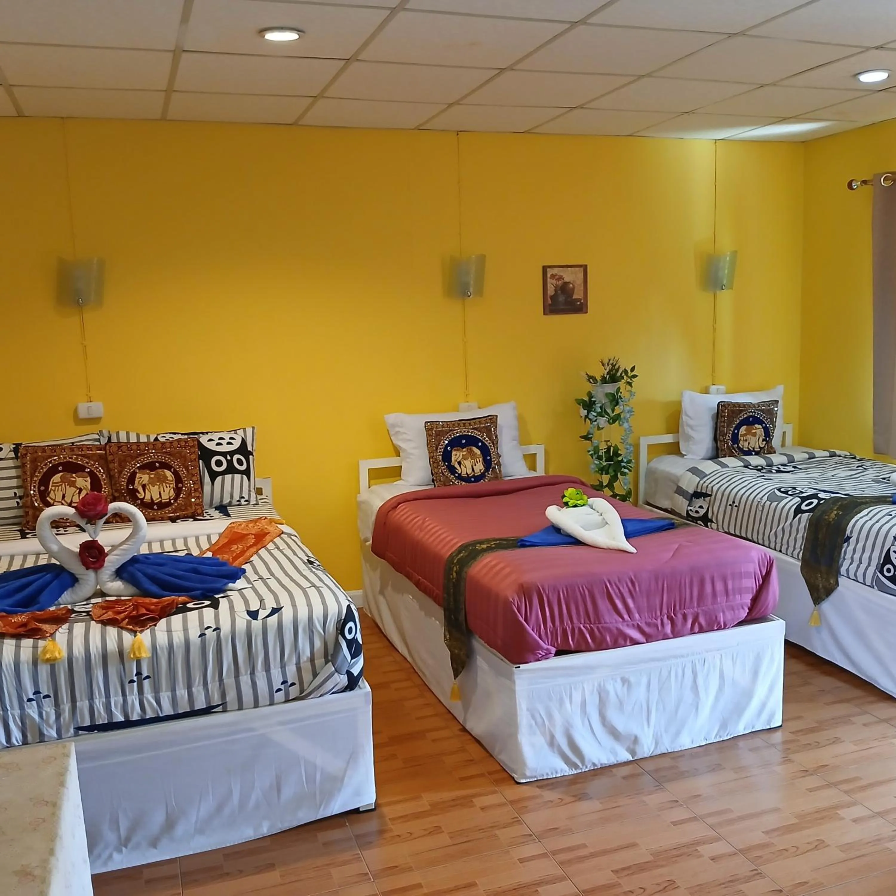 Bed in Thai Garden​ Resort​ Kanchanaburi​