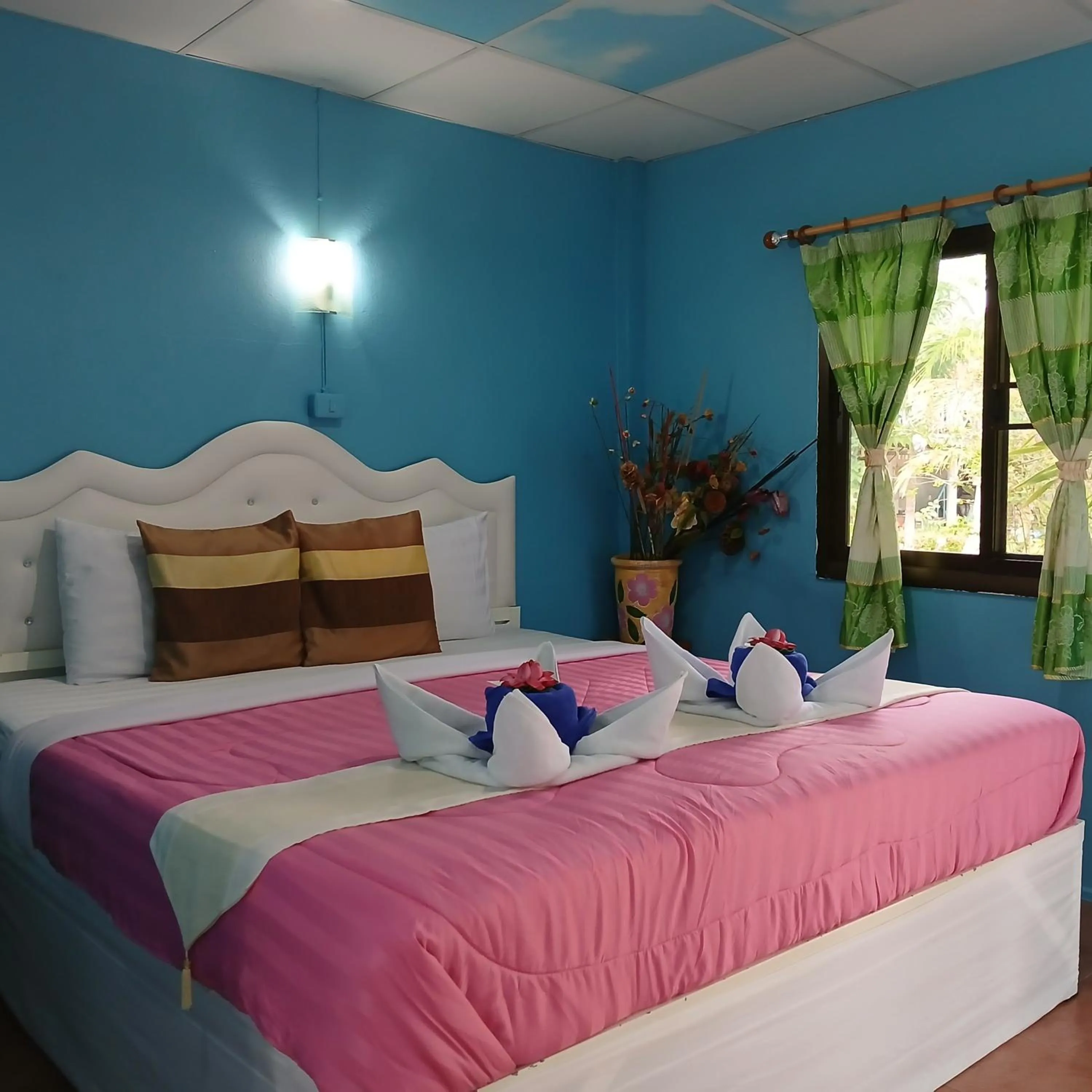 Bed in Thai Garden​ Resort​ Kanchanaburi​