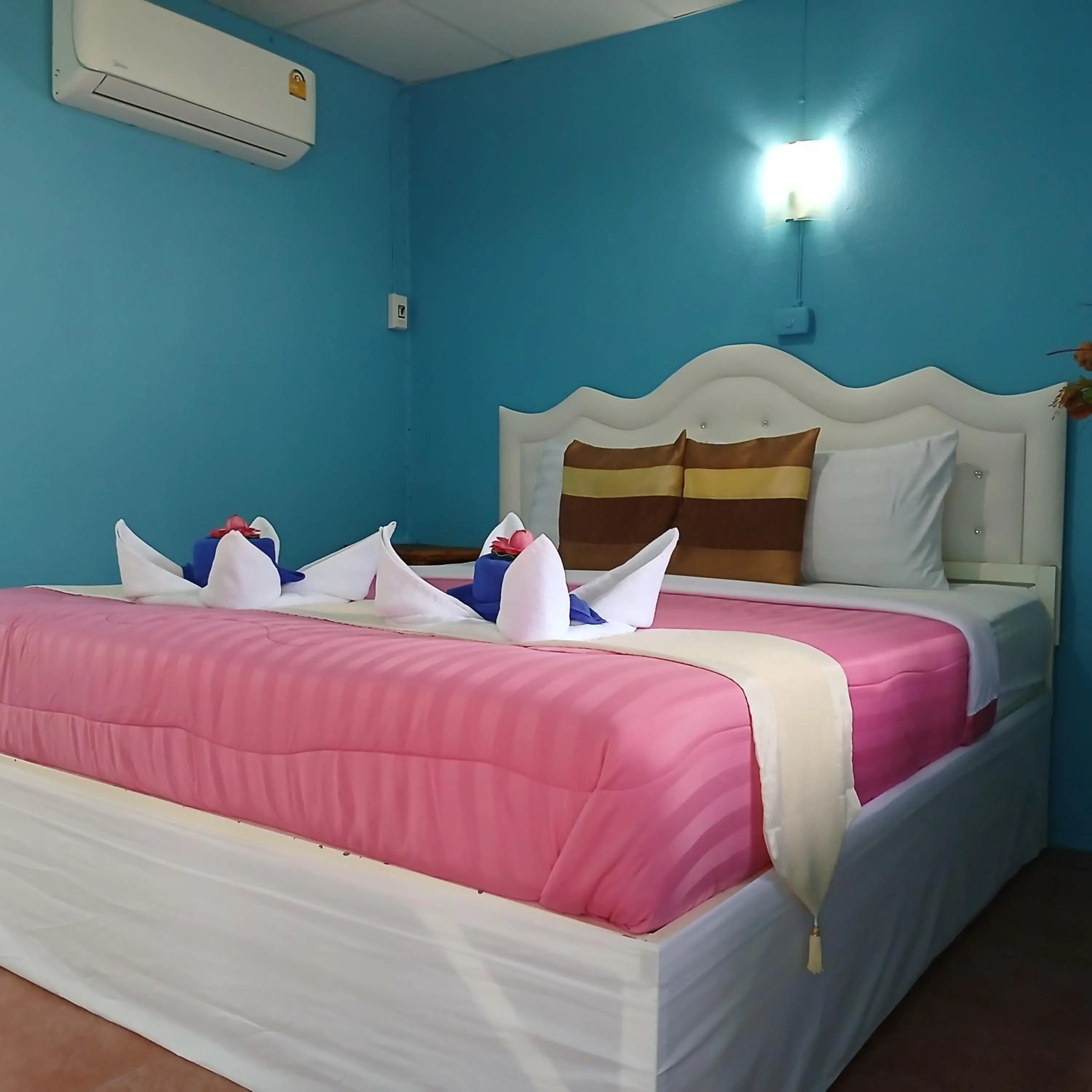 Bed in Thai Garden​ Resort​ Kanchanaburi​