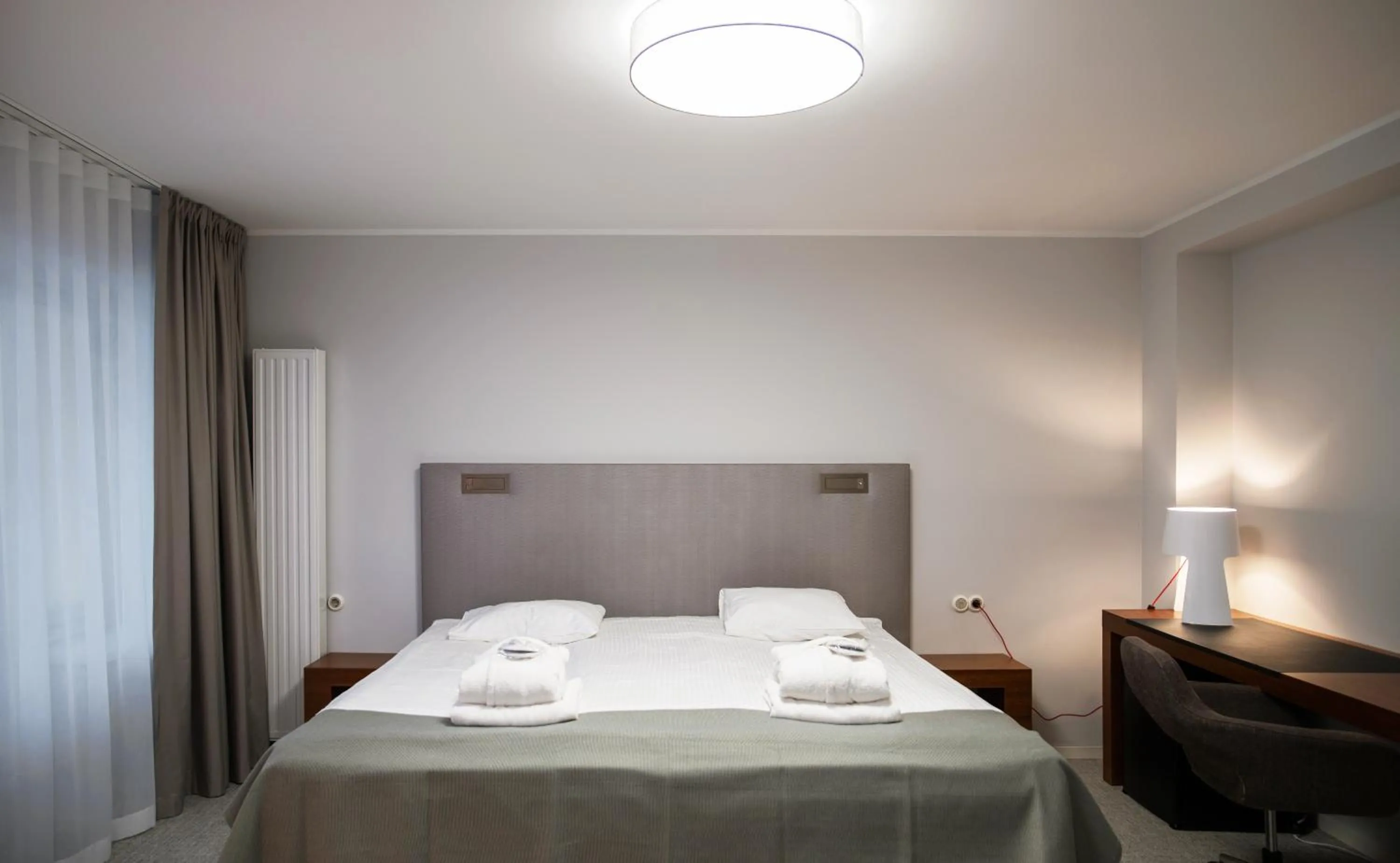 Photo of the whole room, Bed in Wasa Historical 1938 Boutique Hotel
