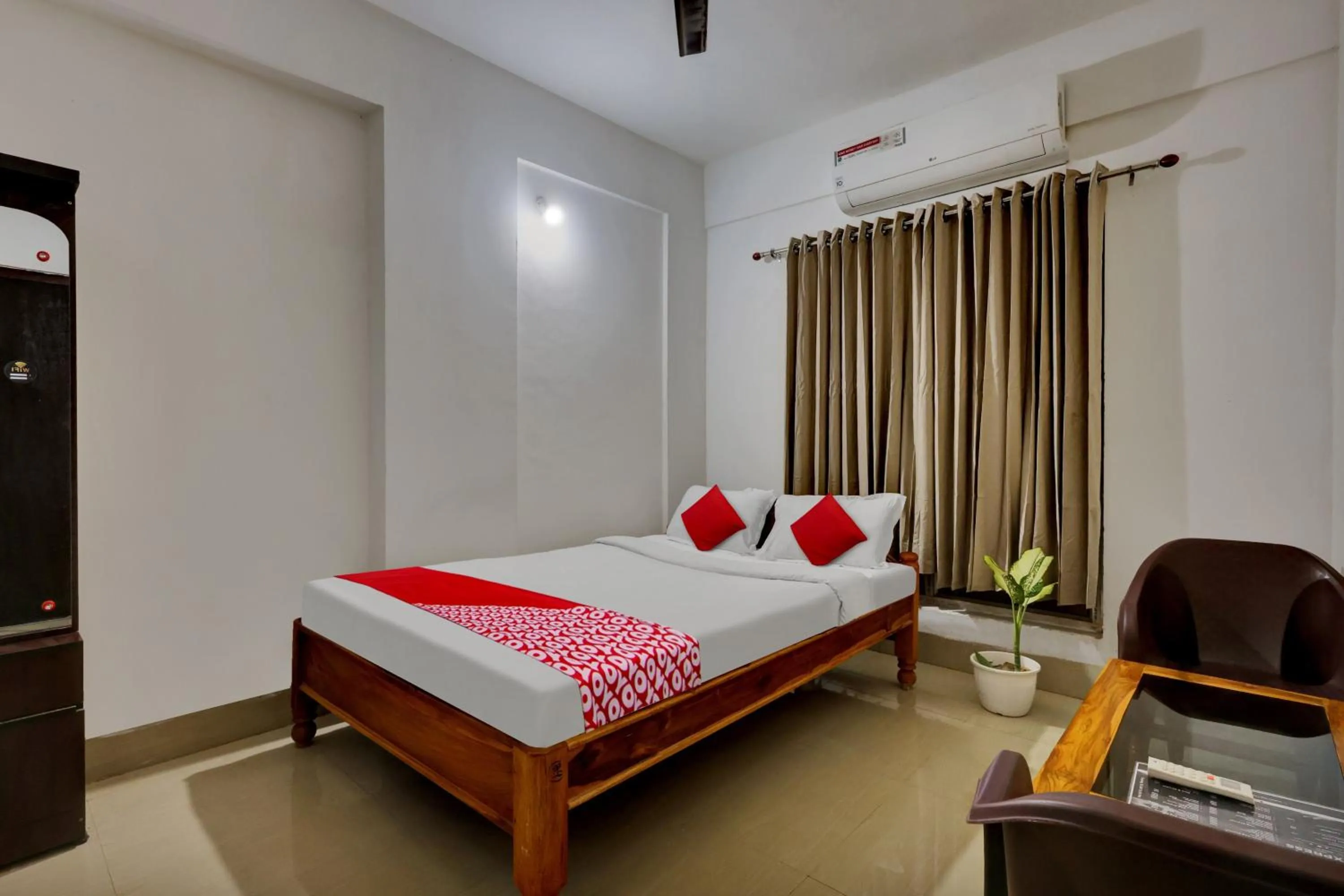 Bedroom in OYO Flagship Larica Green Valley