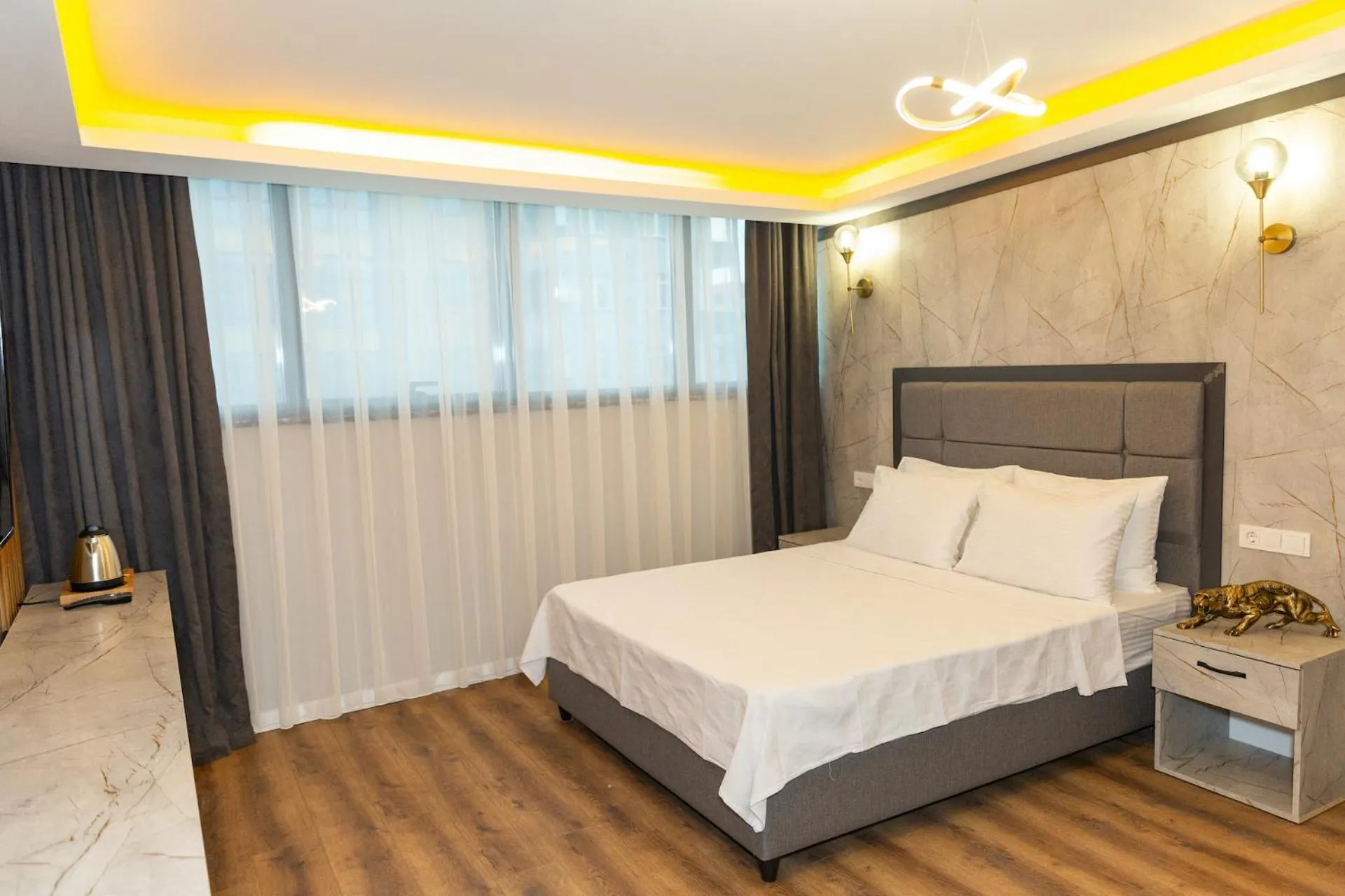 Bed in The Hera Business Hotels & Spa