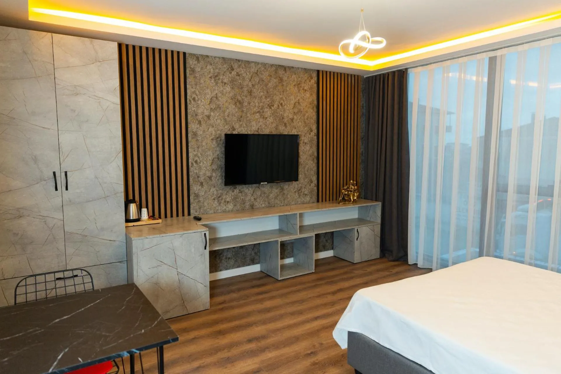 TV and multimedia in The Hera Business Hotels & Spa