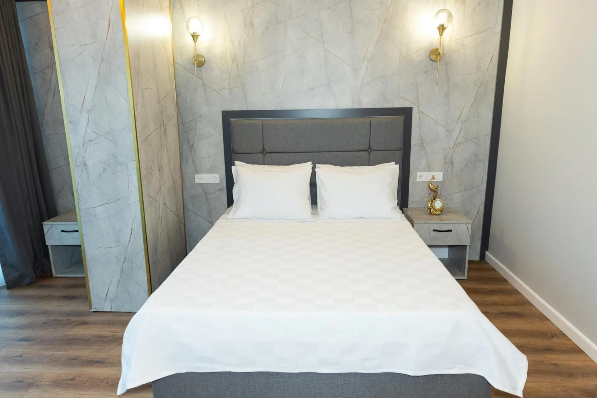 Bed in The Hera Business Hotels & Spa