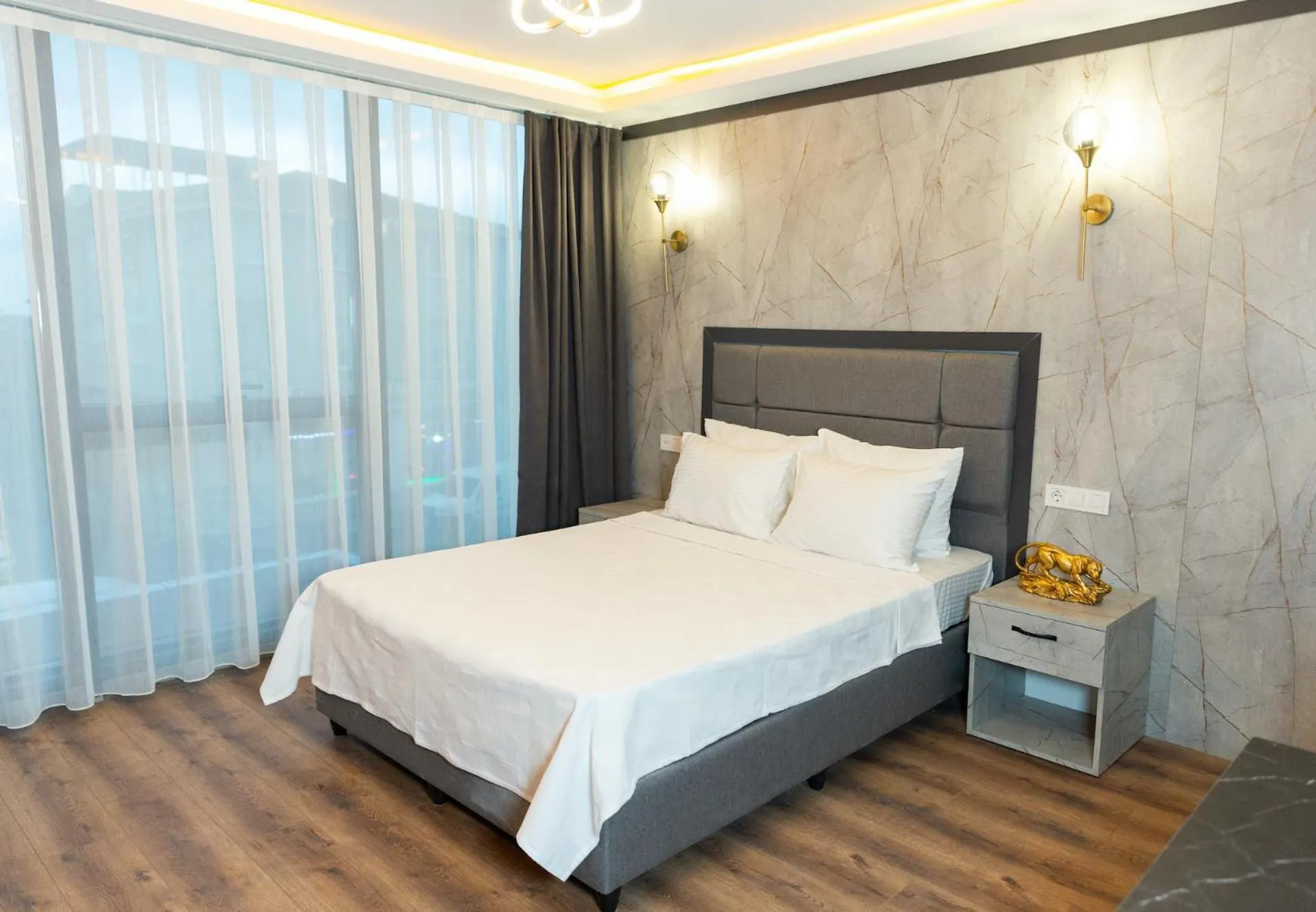Bed in The Hera Business Hotels & Spa