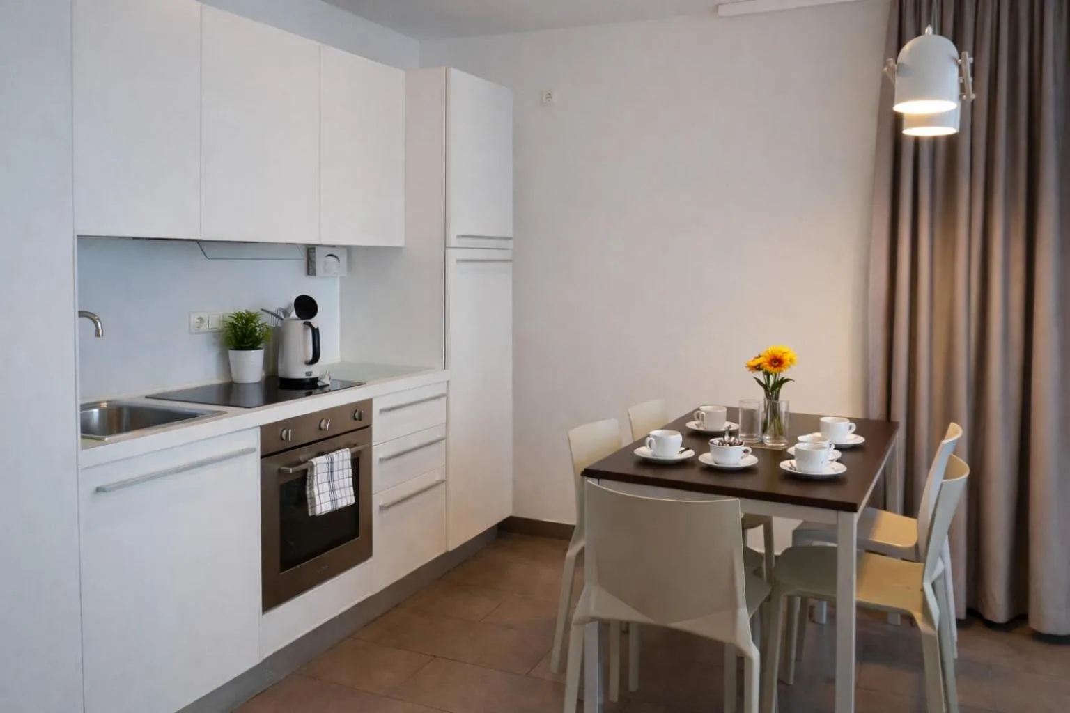 Kitchen or kitchenette in Bayer's Boardinghouse und Hotel