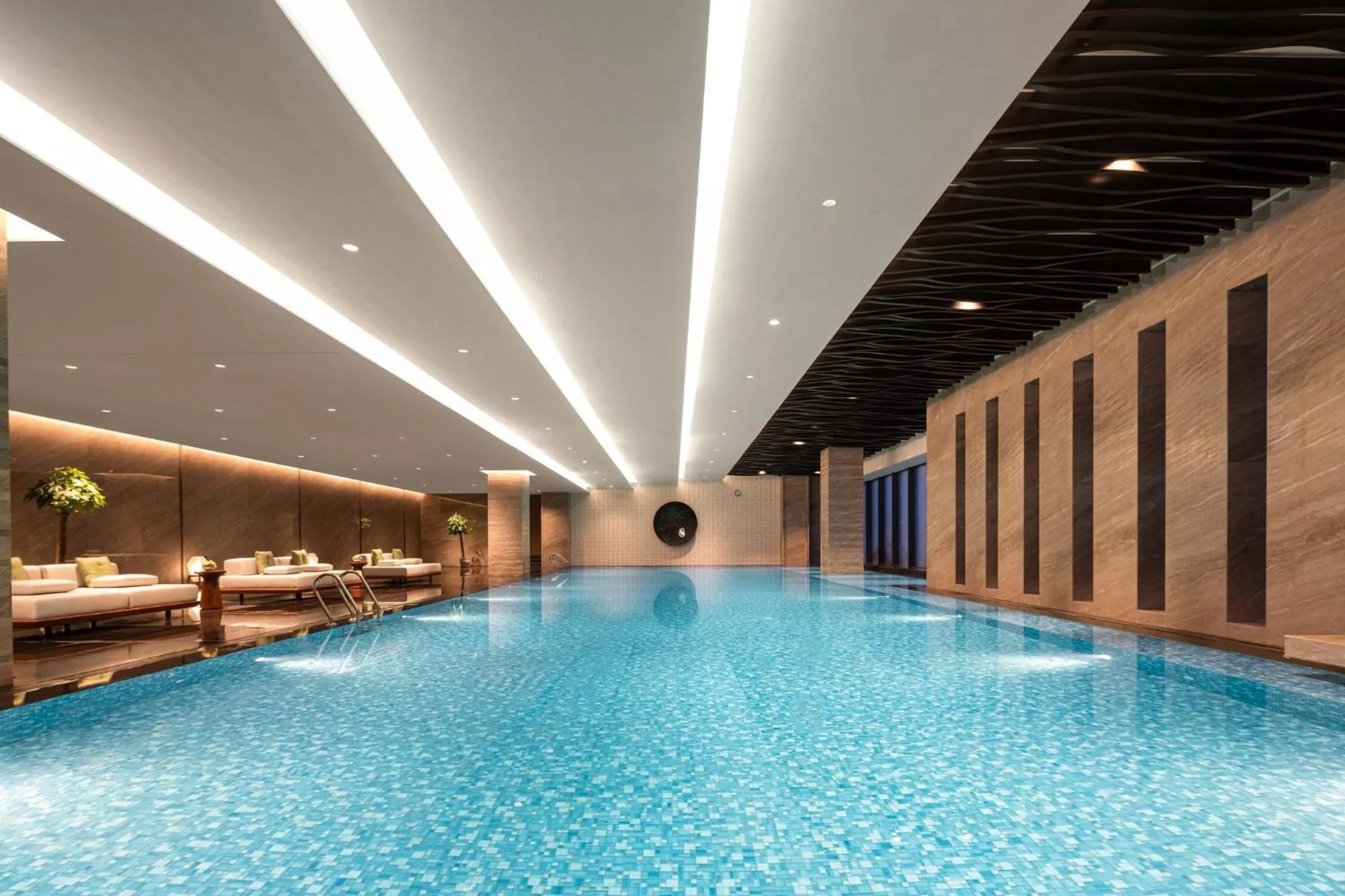 Swimming pool in Crowne Plaza Jinan Runhua by IHG
