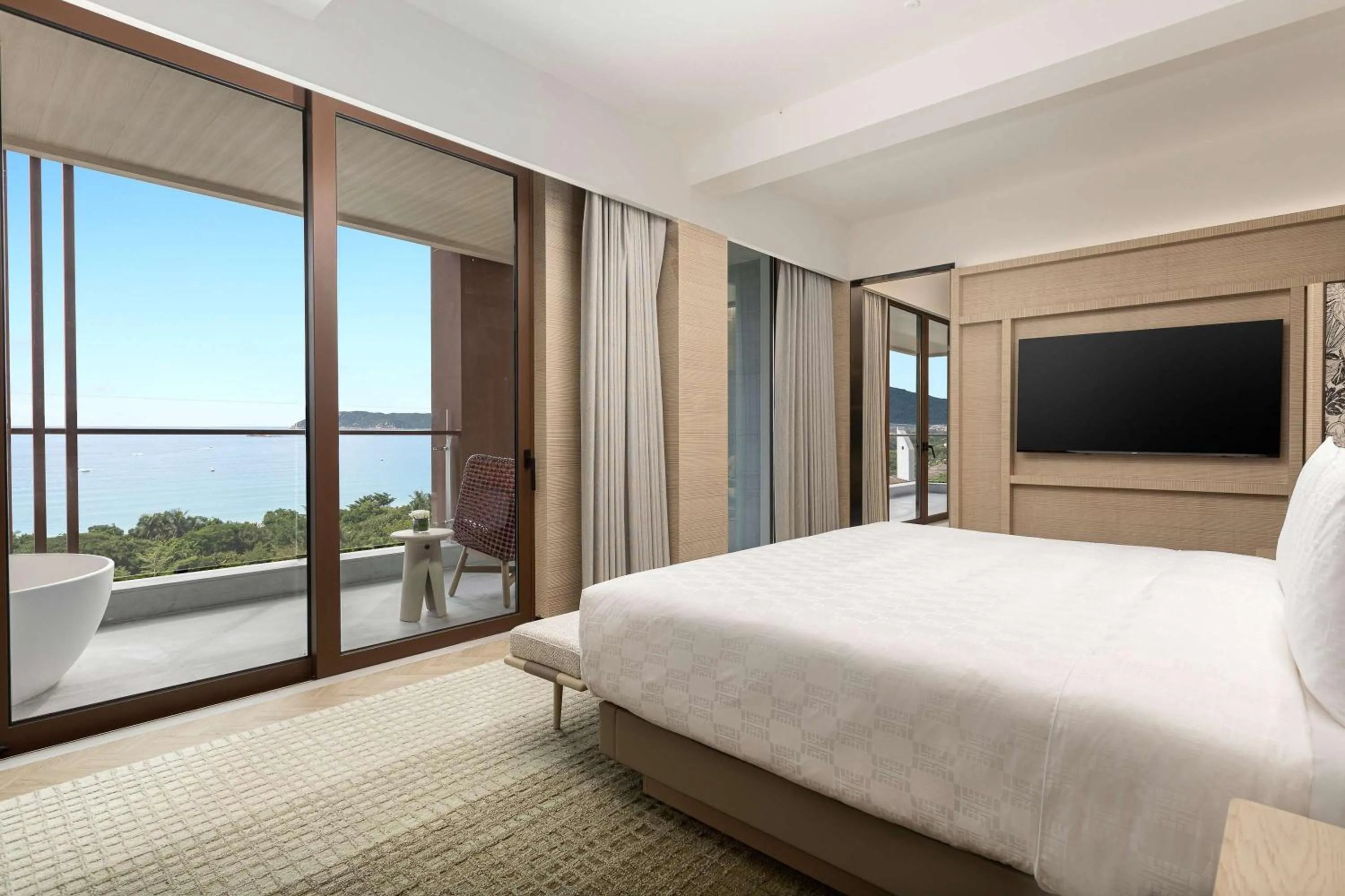 Photo of the whole room, Bed in HUALUXE Sanya Yalong Bay Resort