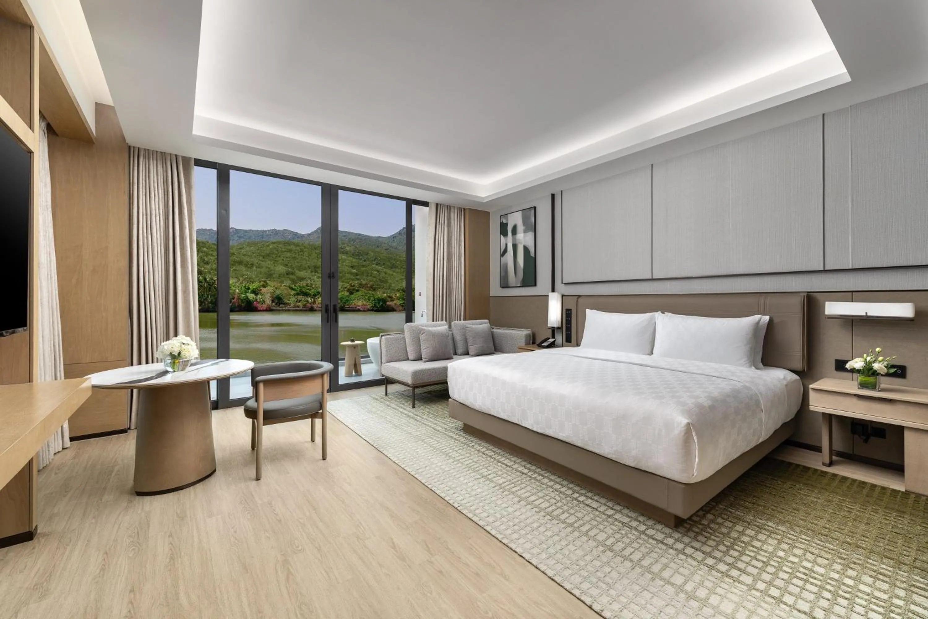 Photo of the whole room, Bed in HUALUXE Sanya Yalong Bay Resort