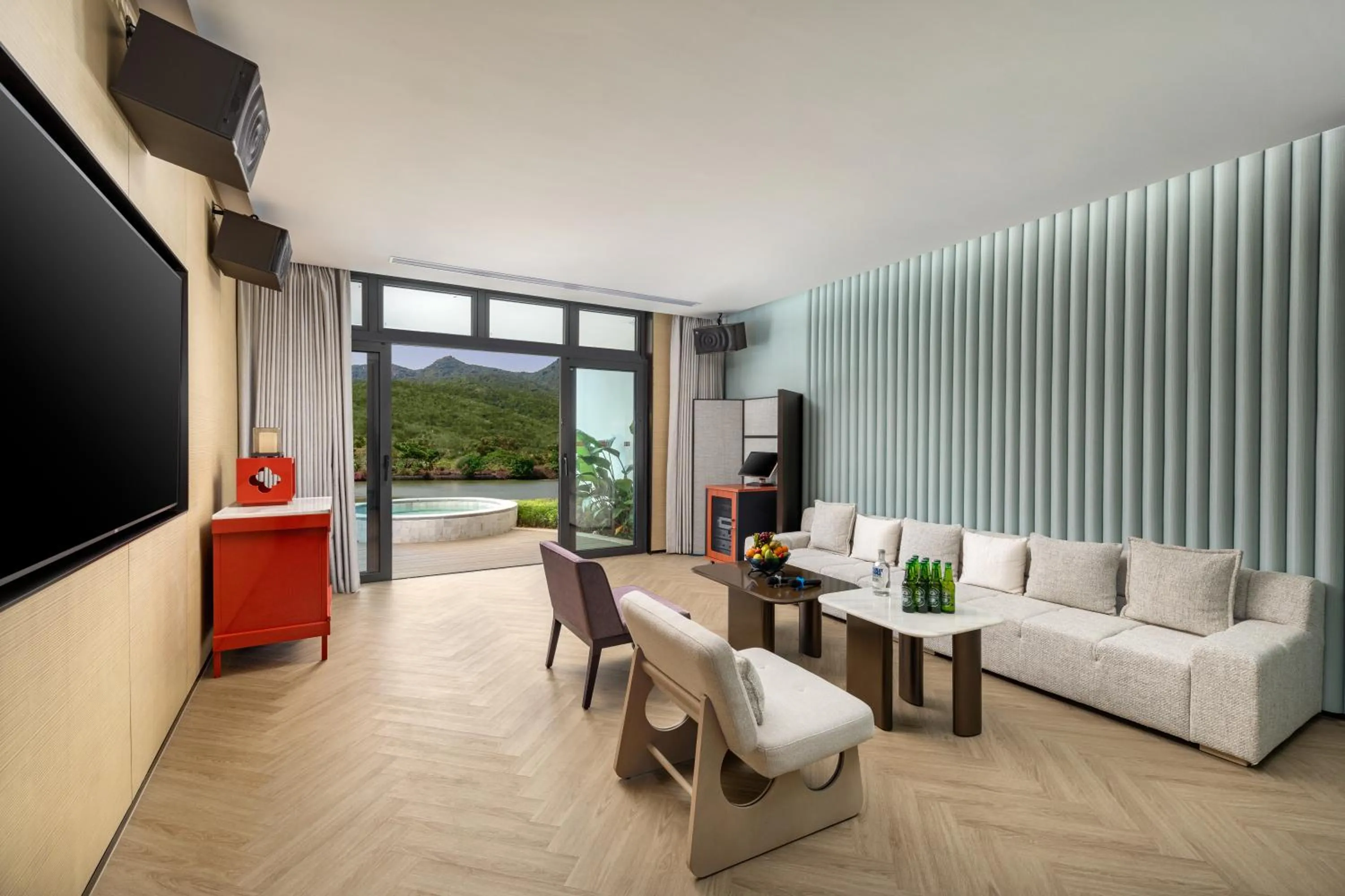 Communal lounge/ TV room in HUALUXE Sanya Yalong Bay Resort