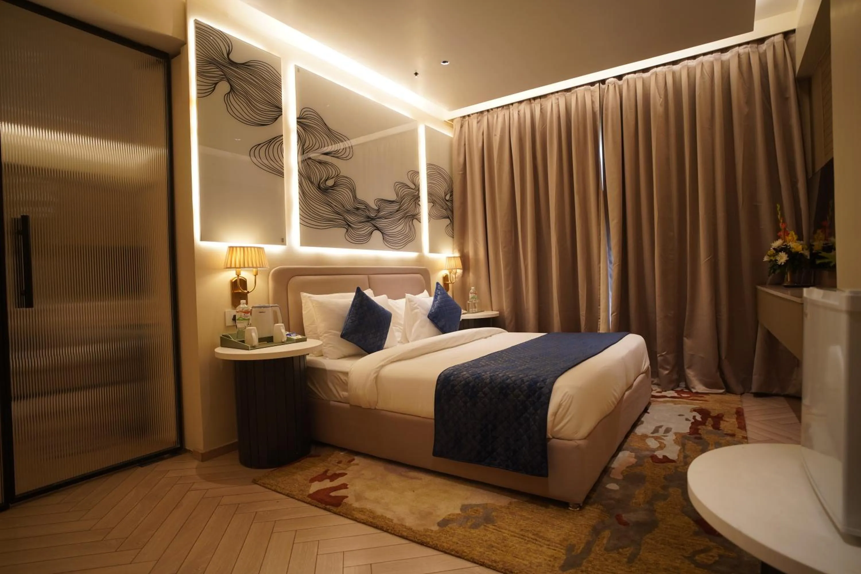 Photo of the whole room, Bed in Chinmay Hotel & Resort