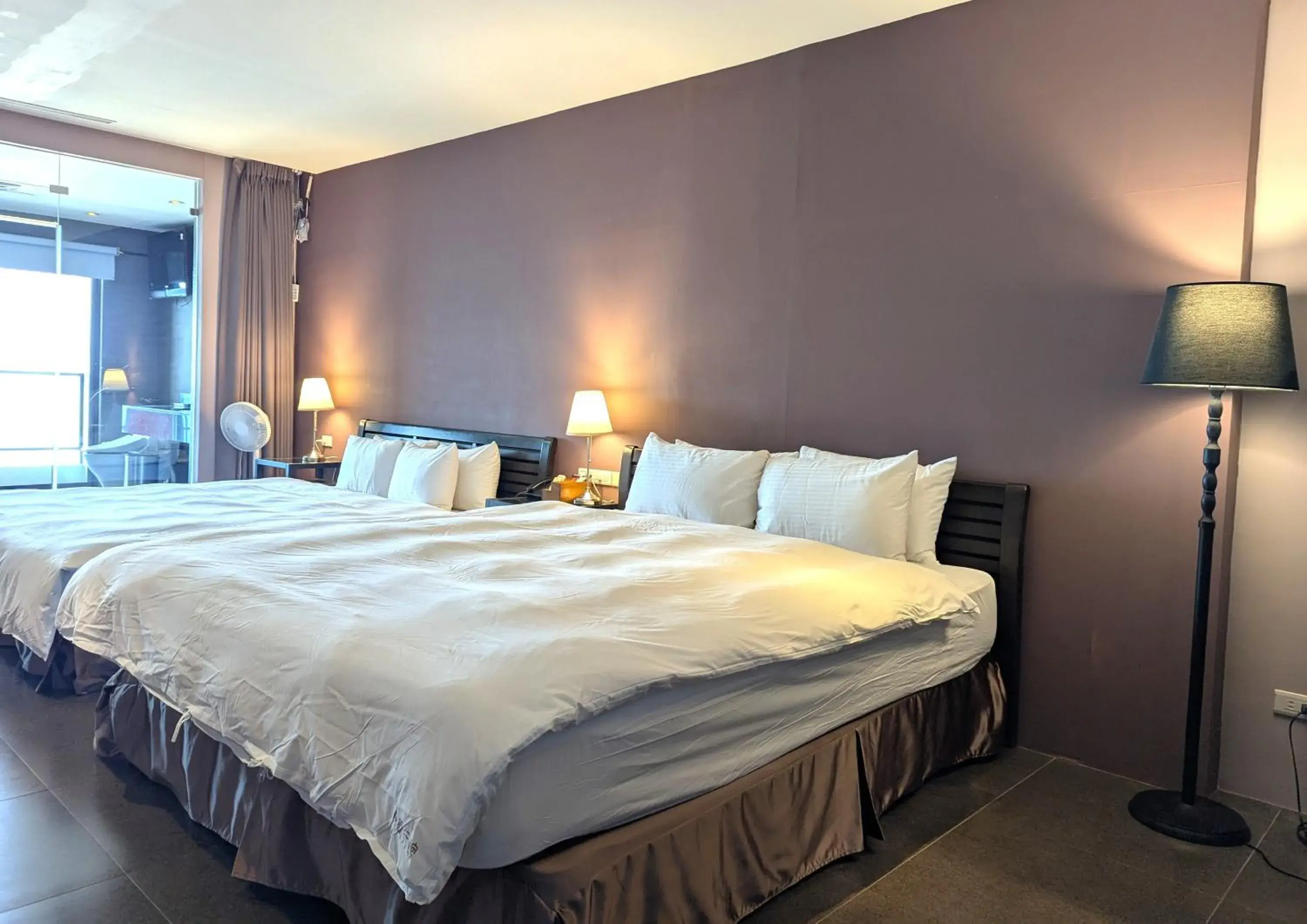 Bed in Jing Guan Hotel Bed in Jing Guan Hotel