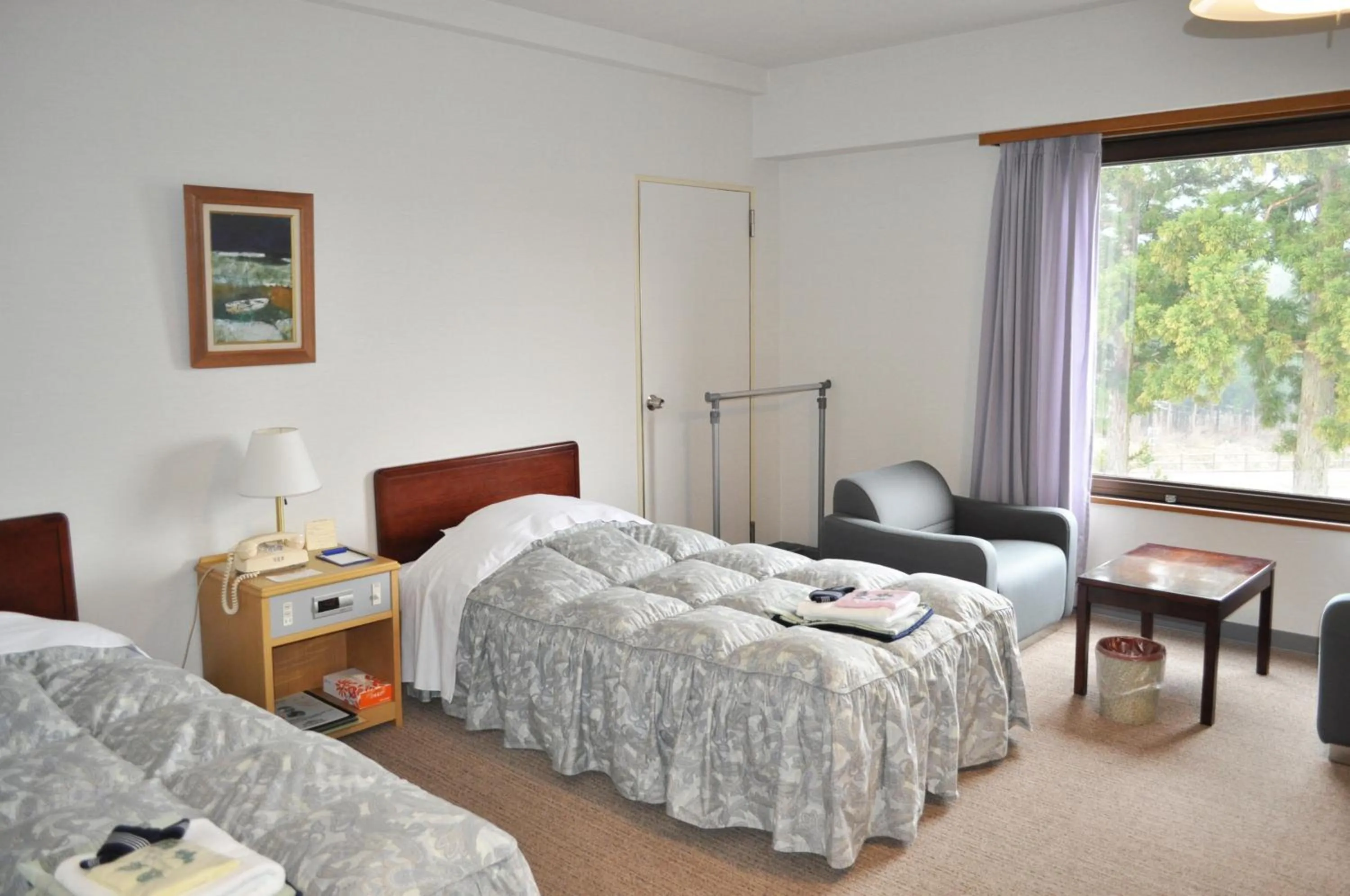 Bed in Tateyama Kokusai Hotel