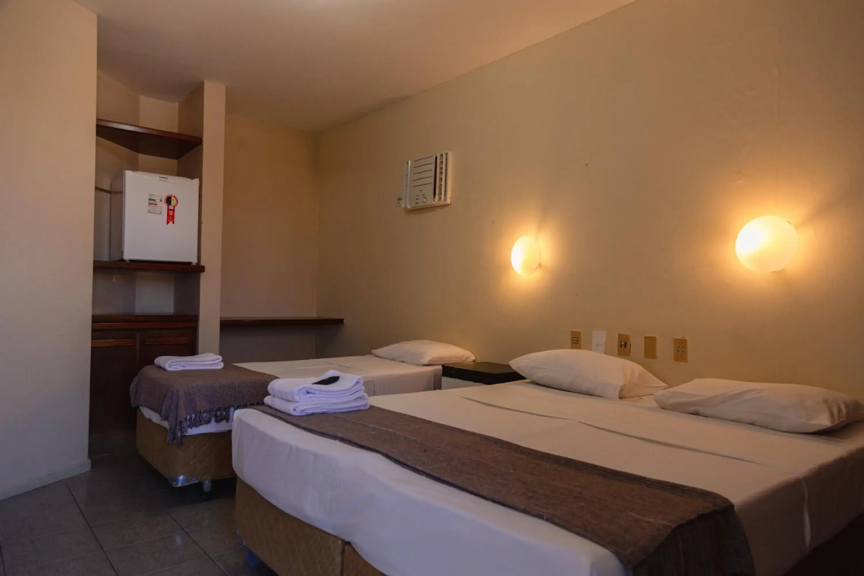 Photo of the whole room, Bed in HANNA Praia Hotel - Florianópolis Photo of the whole room, Bed in HANNA Praia Hotel - Florianópolis