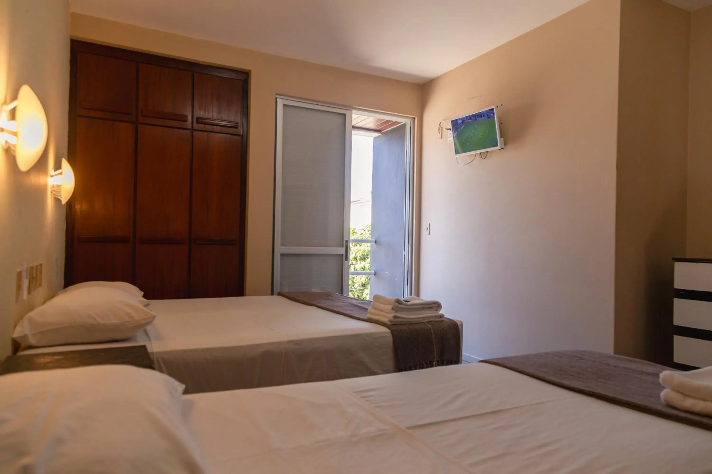 Photo of the whole room, Bed in HANNA Praia Hotel - Florianópolis Photo of the whole room, Bed in HANNA Praia Hotel - Florianópolis